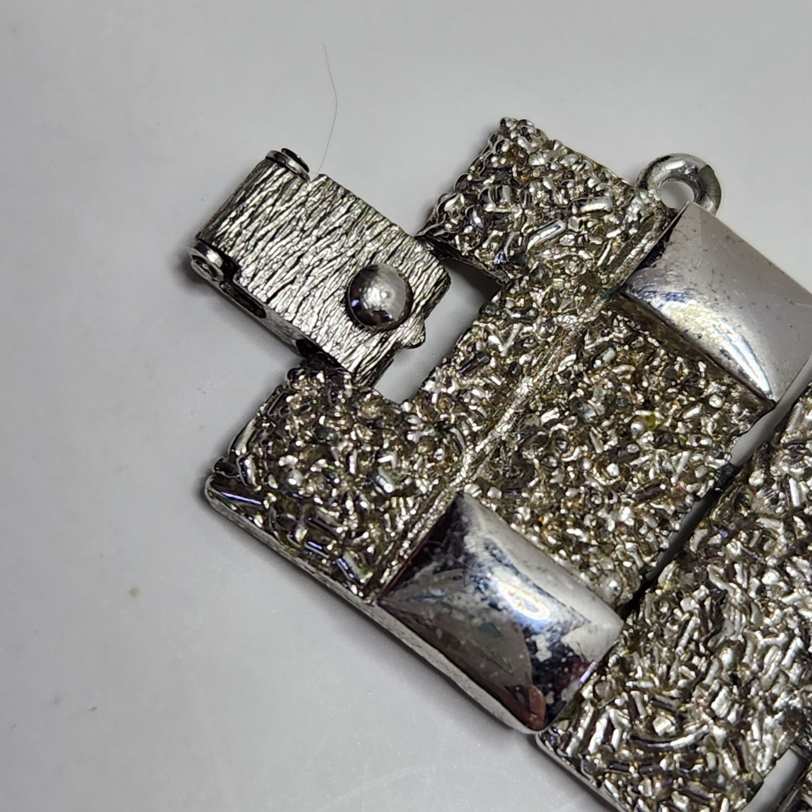 Vintage Monet Silvertone Bracelet Textured 1″ wide 7″ Fold Over Clasp No Safety