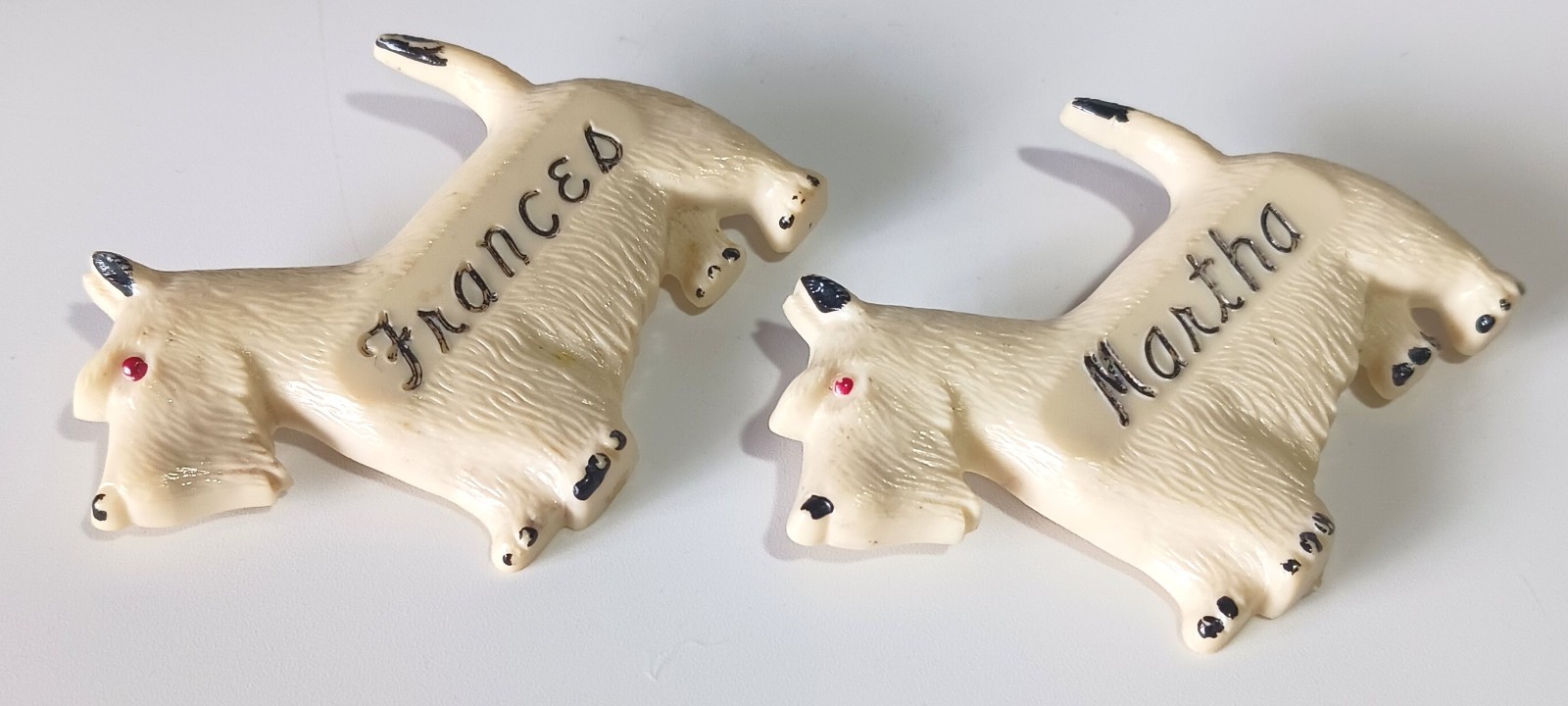 Pair of Vintage Off-White Celluloid Westie Dog Brooches: Frances & Martha