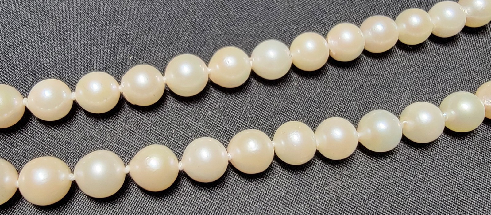 Vintage Pearl Necklace 6.9mm Pearls and 14K Gold Clasp 23.5 in Matinee Length