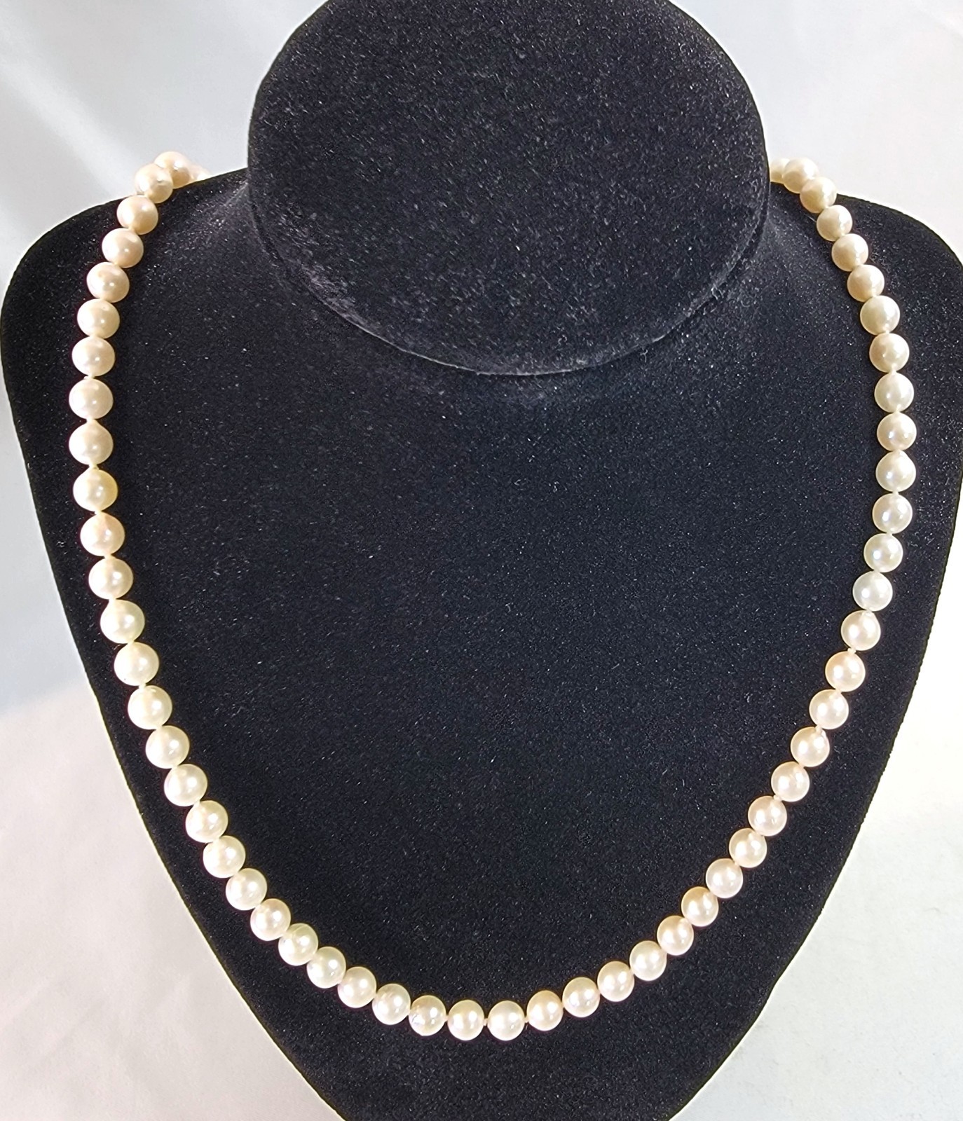 Vintage Pearl Necklace 6.9mm Pearls and 14K Gold Clasp 23.5 in Matinee Length