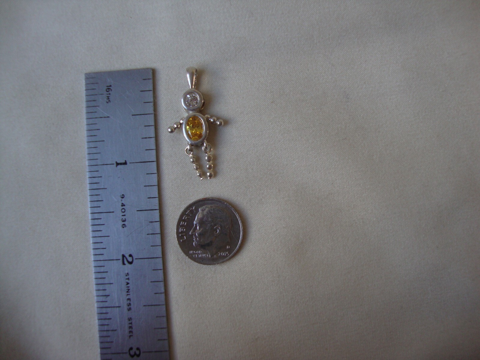 VINTAGE 1980s JIGGLY LEGS BOY OVAL YELLOW CZ BIRTHSTONE SILVER 925 CHARM/PENDANT