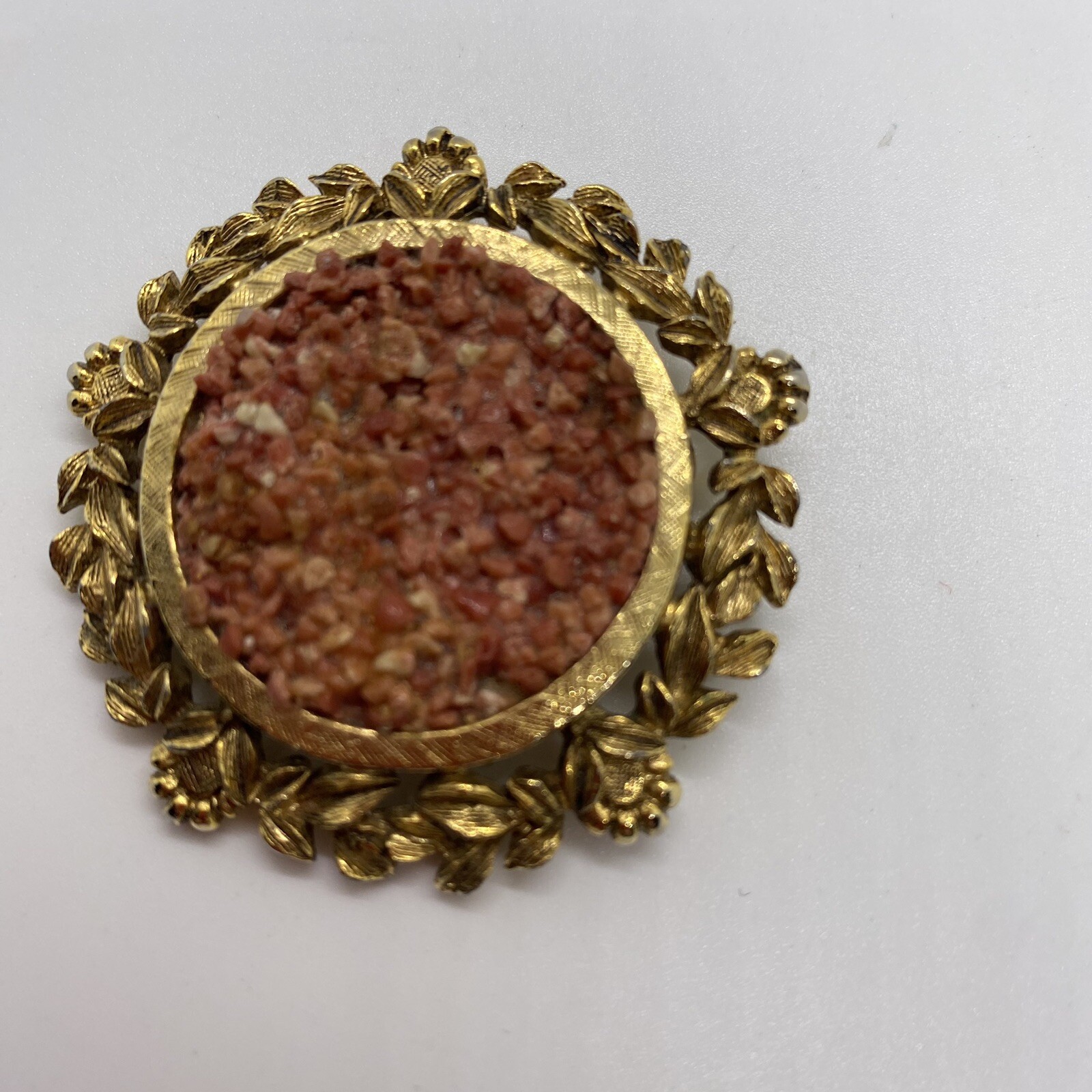 Brooch- Vintage Round Gold Tone Designed Trim With Small Salmon Color Stone Pin