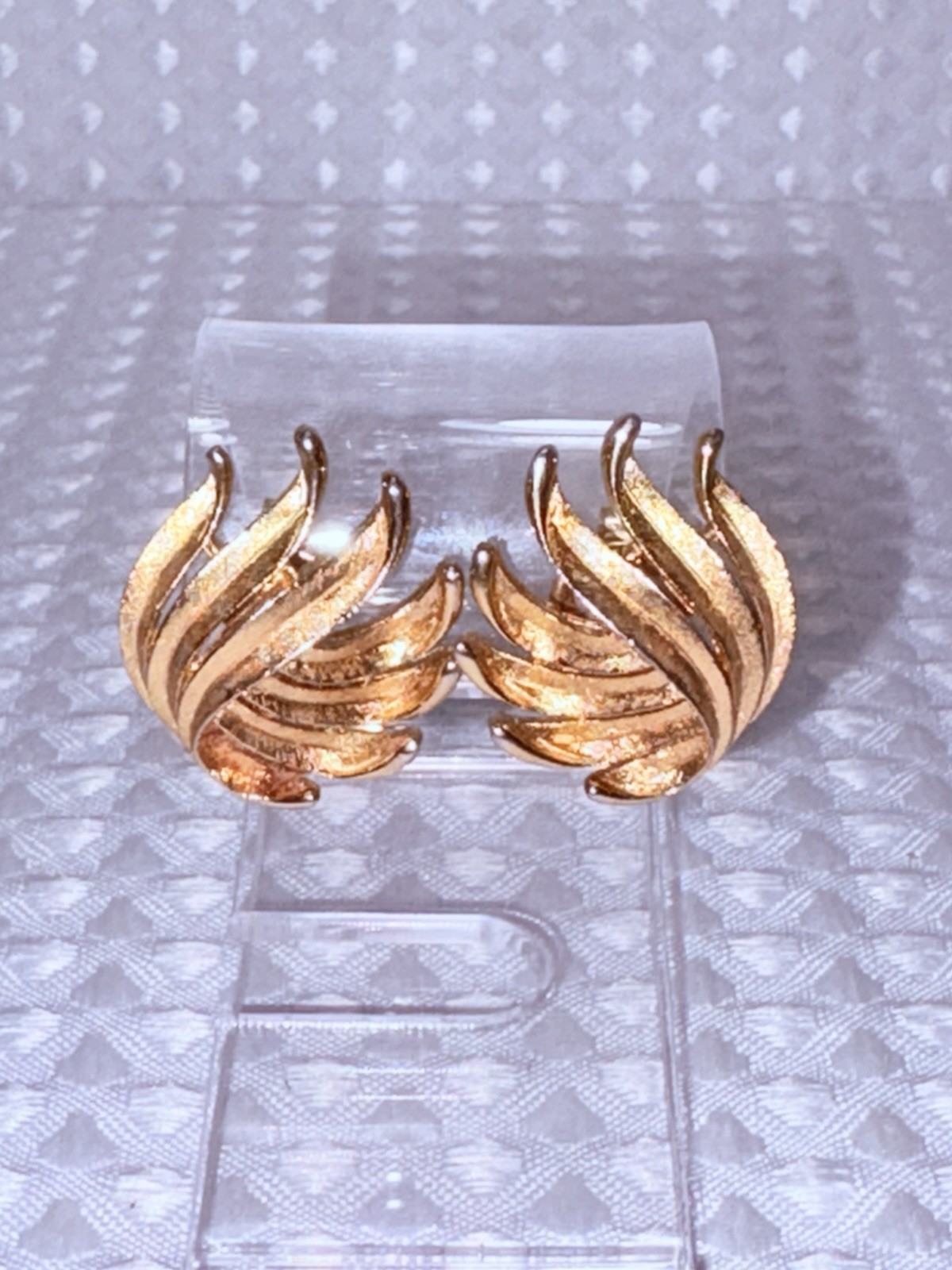 Vintage Crown Trifari brushed gold tone finish leaf clip-on earrings