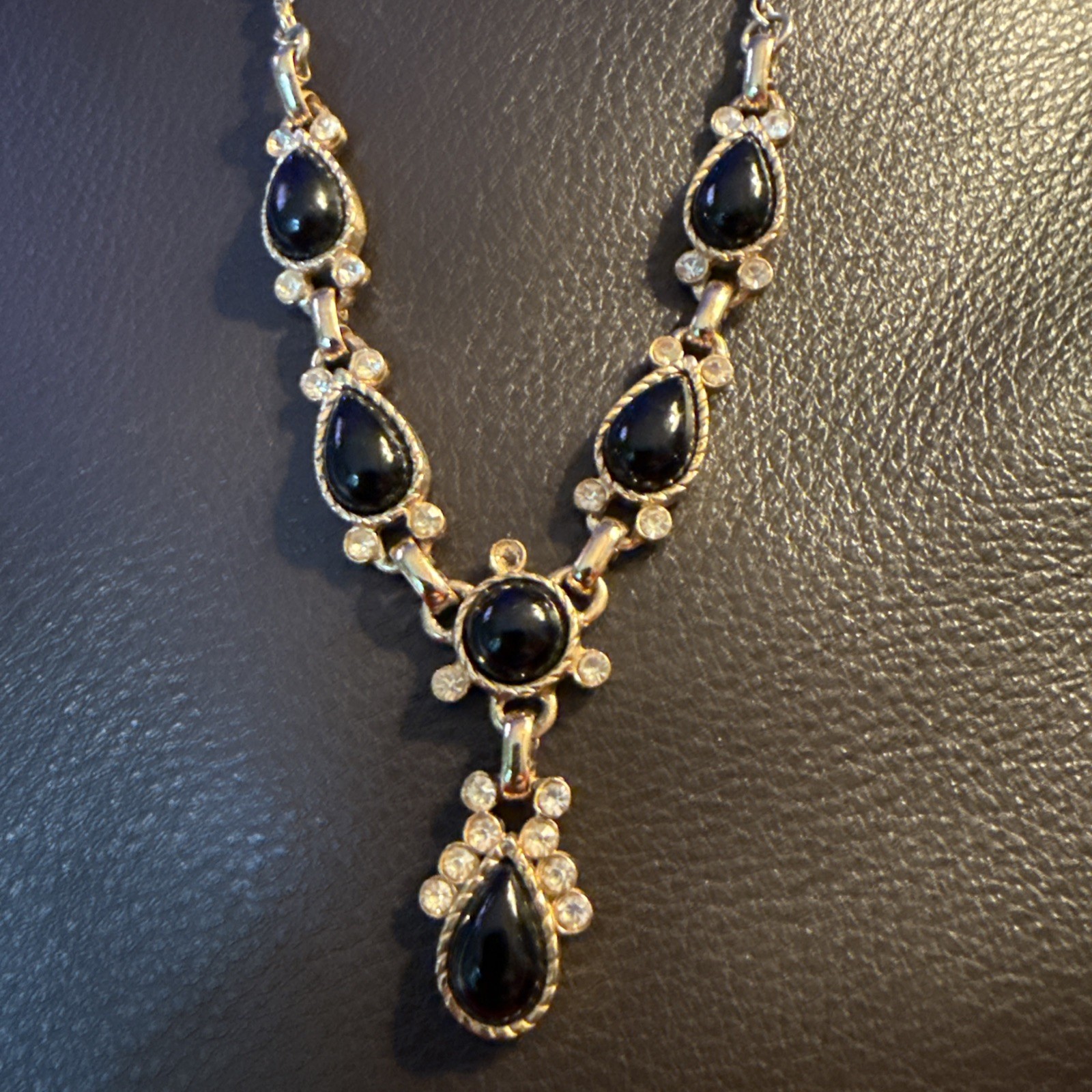 Vintage Black and Gold Toned /Rhinestone Tear Drop Necklace 16”. 57