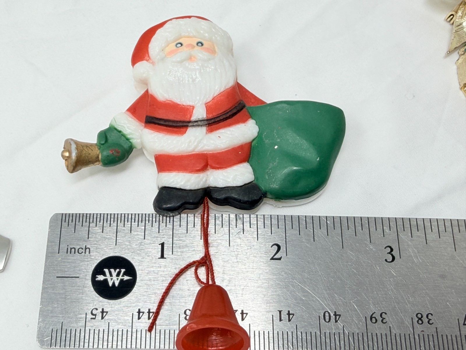 Vintage Fun World Santa Claus Moving Arms Sack of Toys Christmas Plastic Pin
