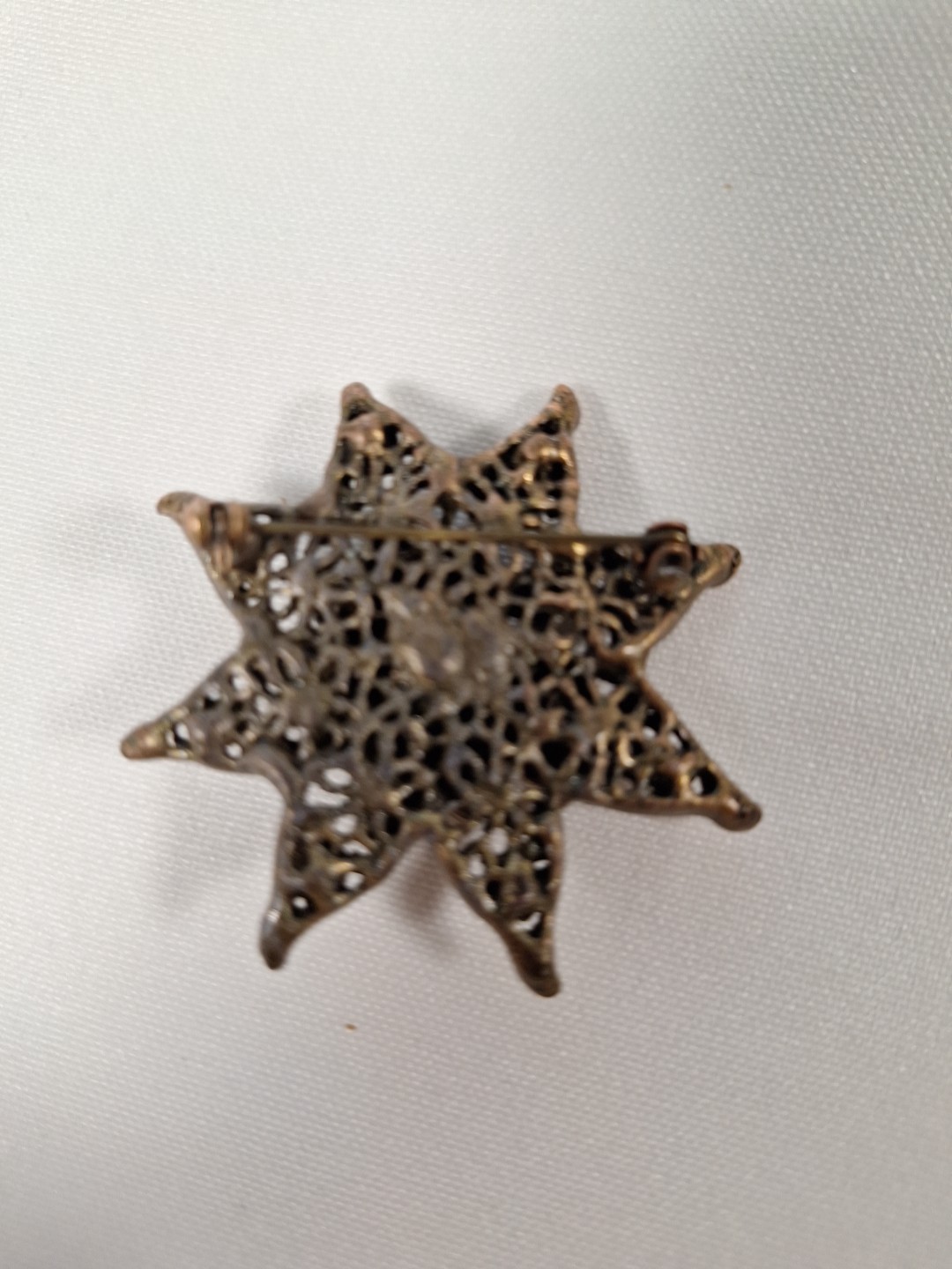 Brass Tone 8 Pointed Star Brooch With Topaz & Amber Stones