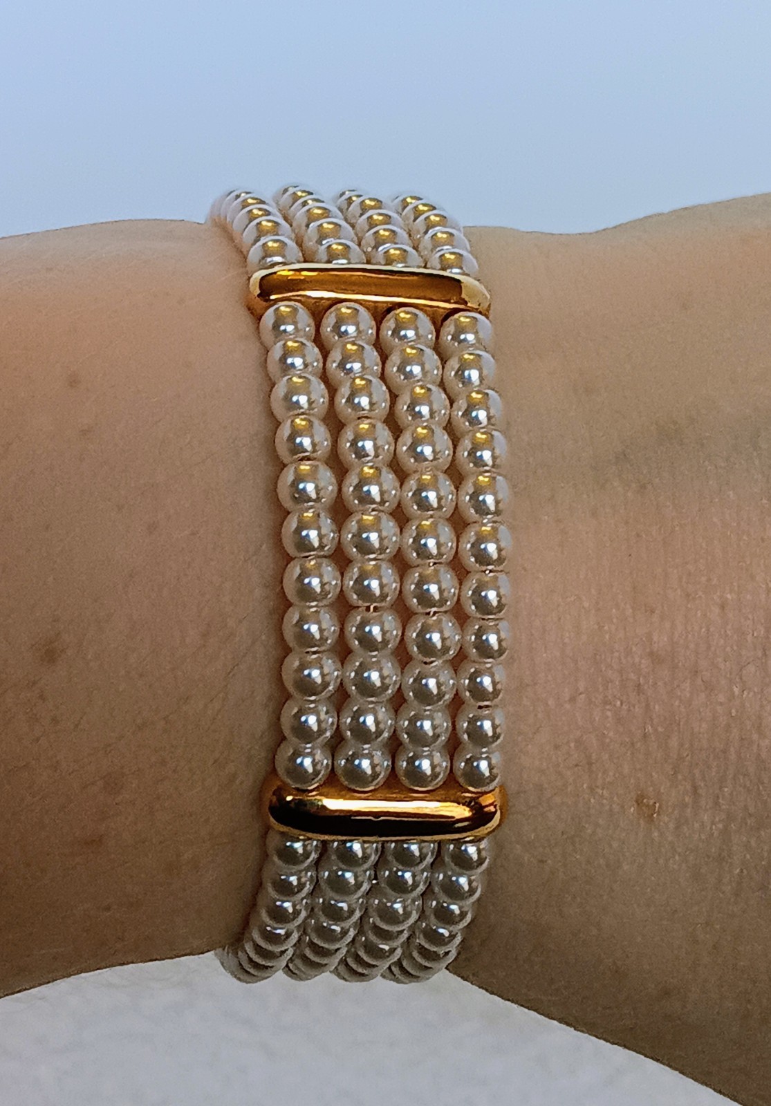 Vintage 4 Strand Faux Pearl Goldtone Tension Cuff Bracelet 7.5 in