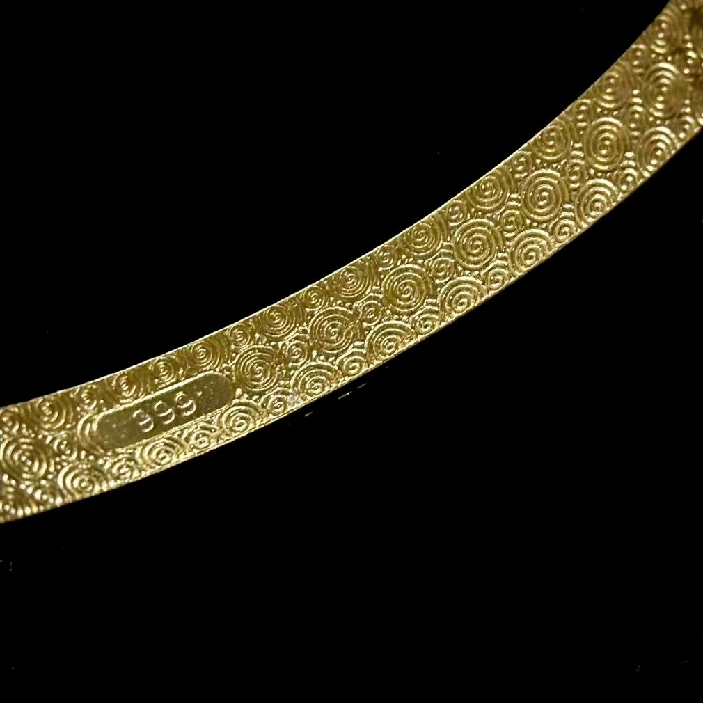 Golden Cuff Bangle Bracelet Gold-wash (NOT SURE) marked ‘999’, 7.5 in adjustable
