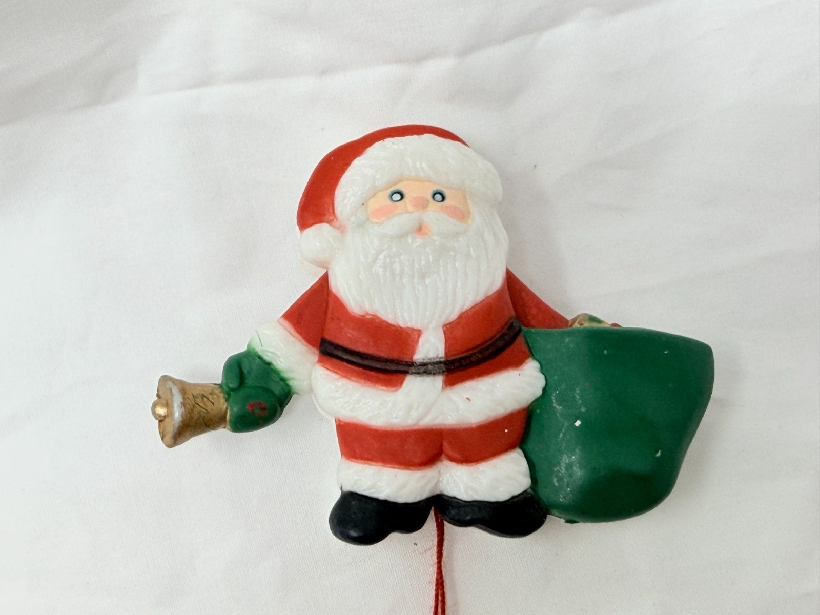 Vintage Fun World Santa Claus Moving Arms Sack of Toys Christmas Plastic Pin