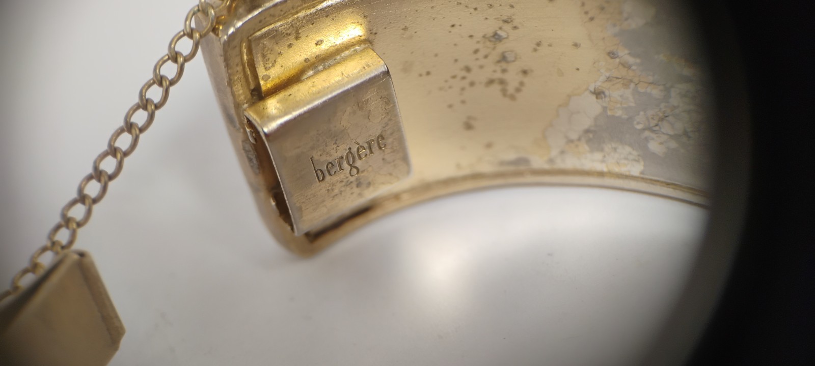 bergere goldtone hinge cuff bracelet inlaid w/soft redish brown material-nd6
