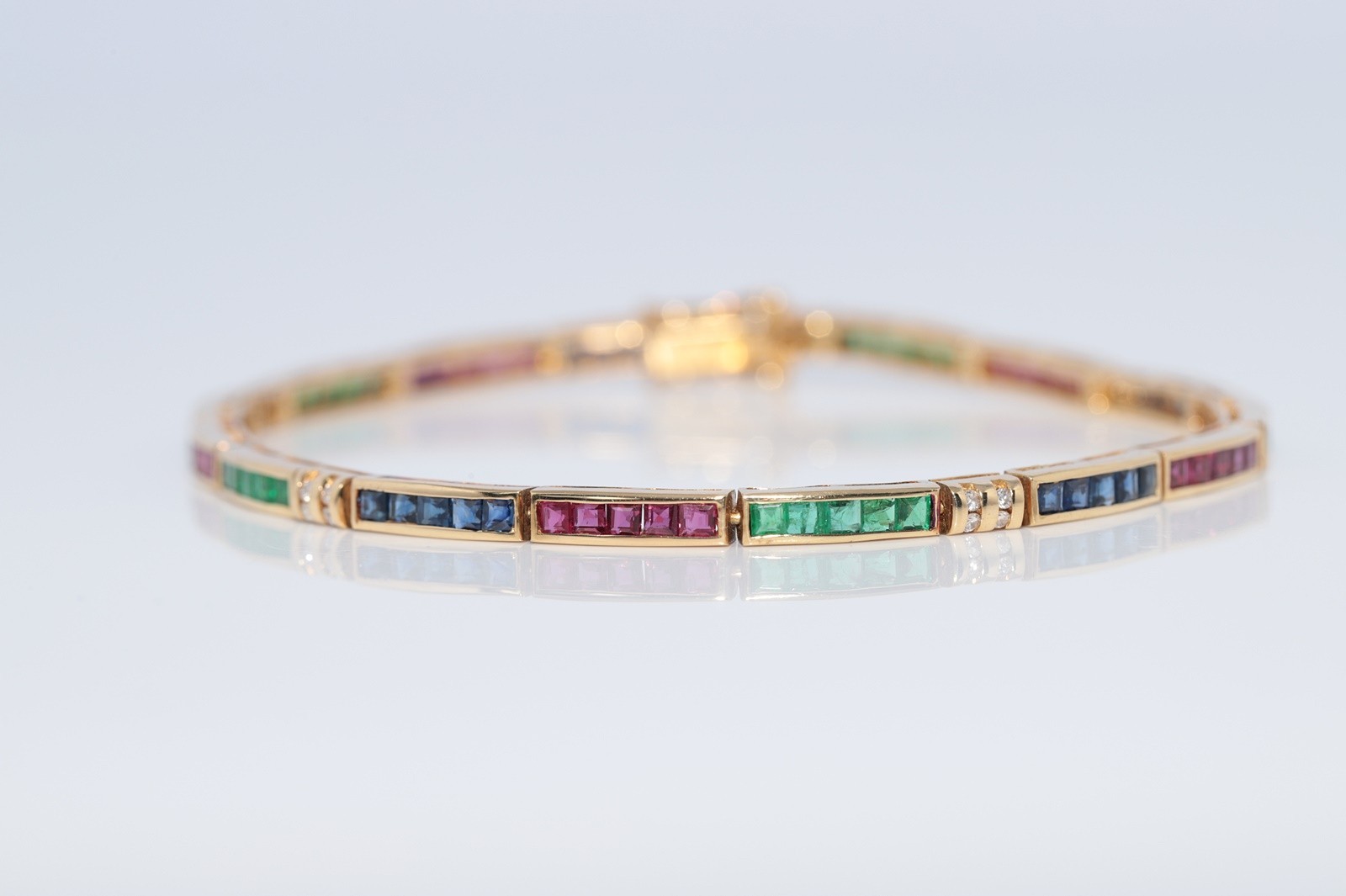 Vintage Circa 1980s 18k Gold Natural Diamond And Emerald Ruby Sapphire Bracelet