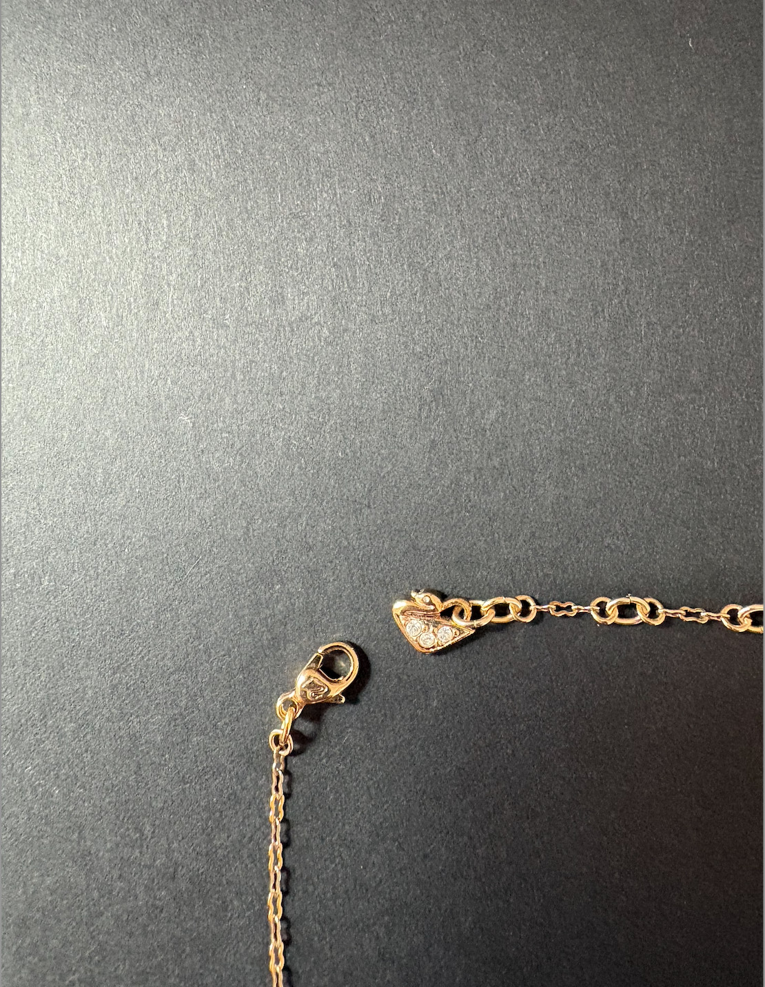 Swarovksi necklace with iridescent pendant on gold chain