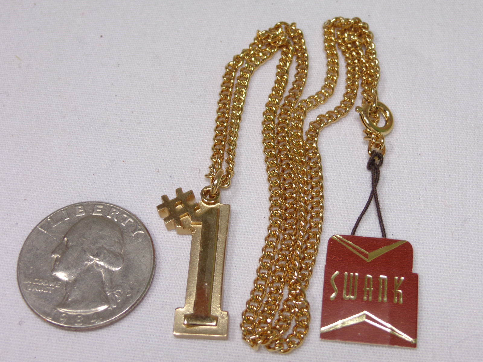 VINTAGE GOLD TONE NECKLACE SWANK 1970’S 1980’S NOS #1 PENDANT ONE FIRST PLACE