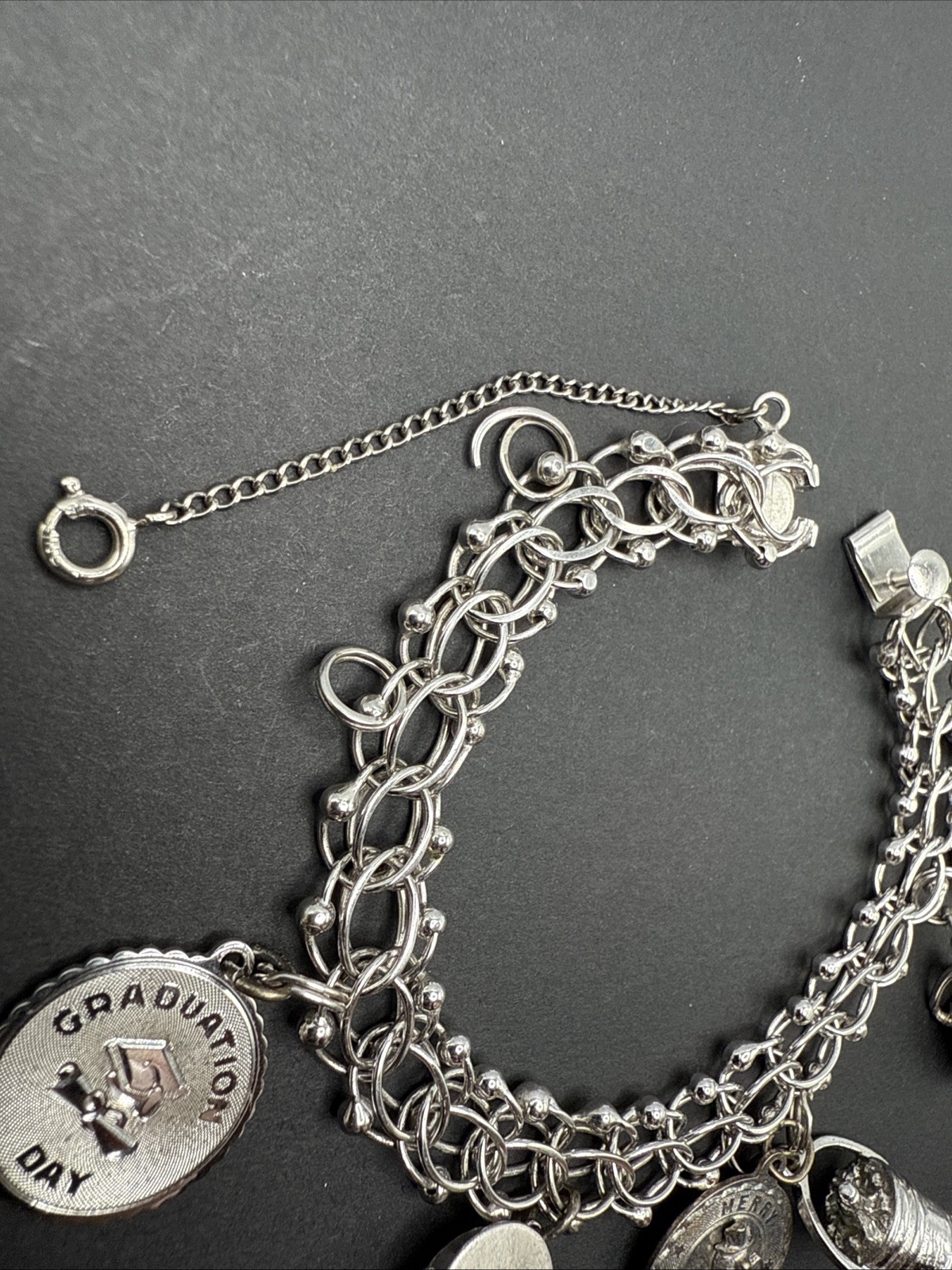 VINTAGE STERLING SILVER CHARM BRACELET Champagne Hat Barrel Grad 32 G 7” J13