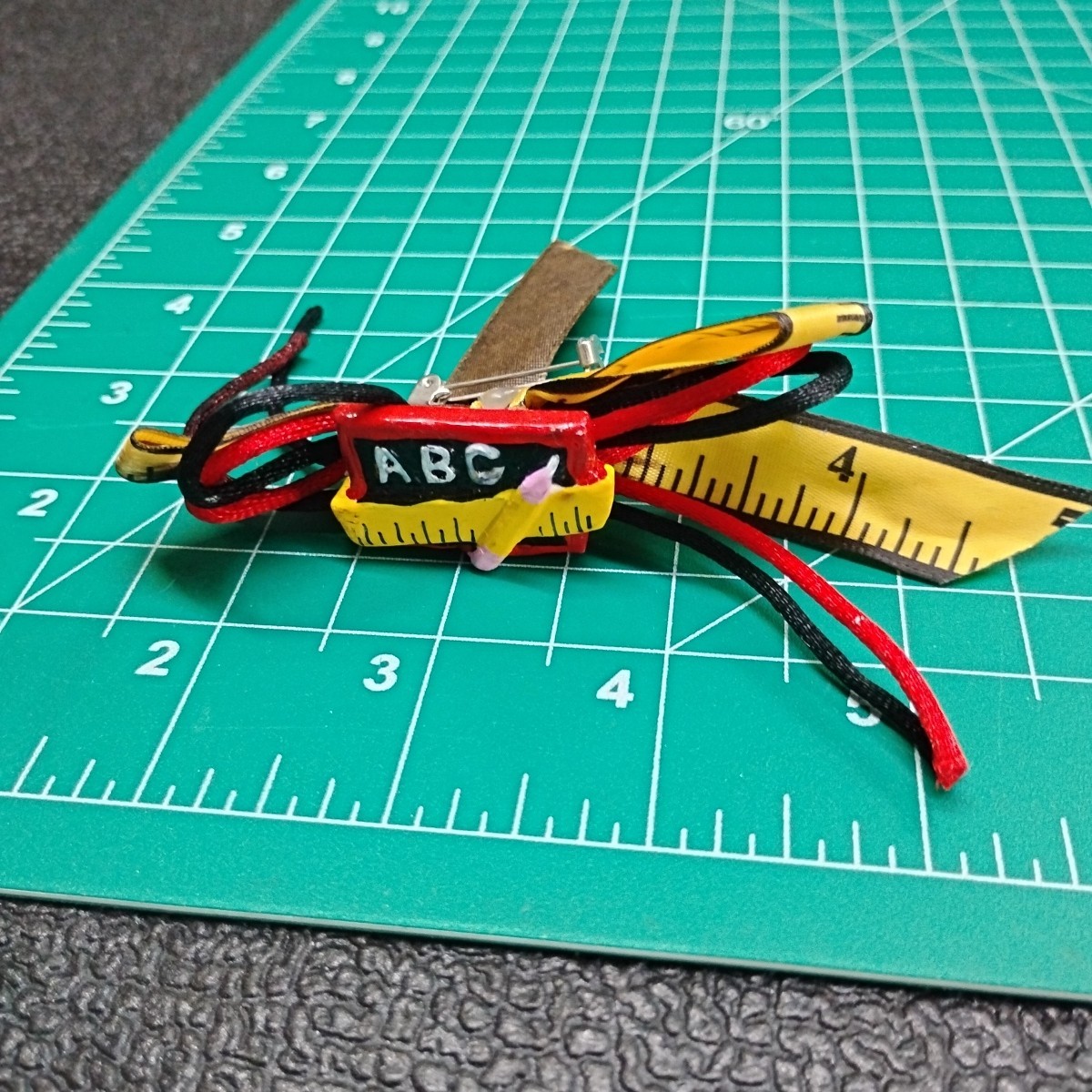 Vintage ABC Chalk Board Tape Measure Cord Teacher Pin Brooch