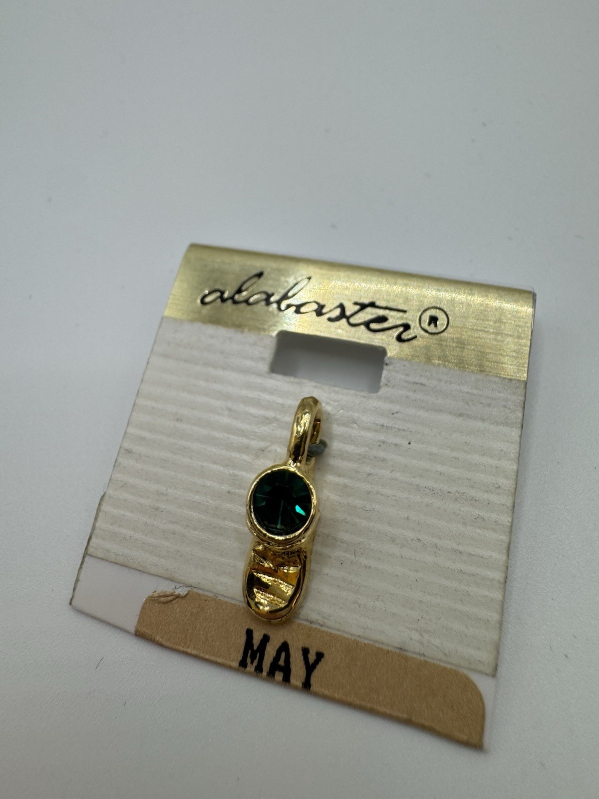 Vintage “Alabaster” Baby Bootie May Birthstone Emerald Green Charm Gold-tone