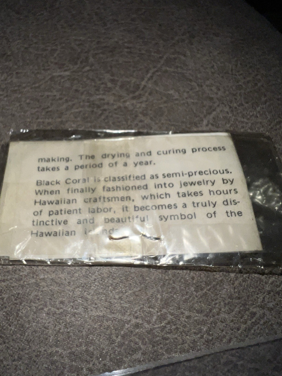 Vintage Hawaiian black coral pendant (in original package)
