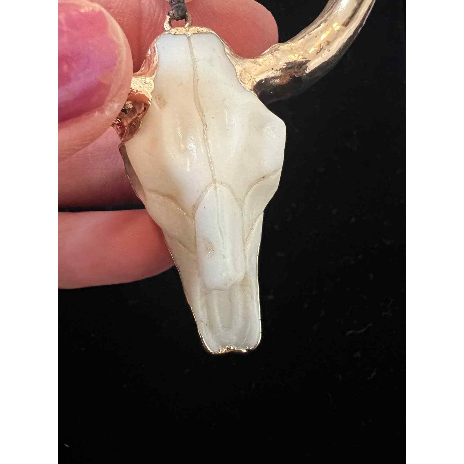 Hand knotted Bull necklace. Beads are either glass or real stones I’m not sure.