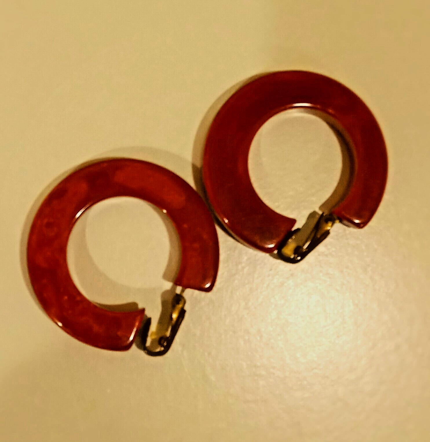 Vintage lovely bakelite hoop earrings appx. 1 1/2 ” across