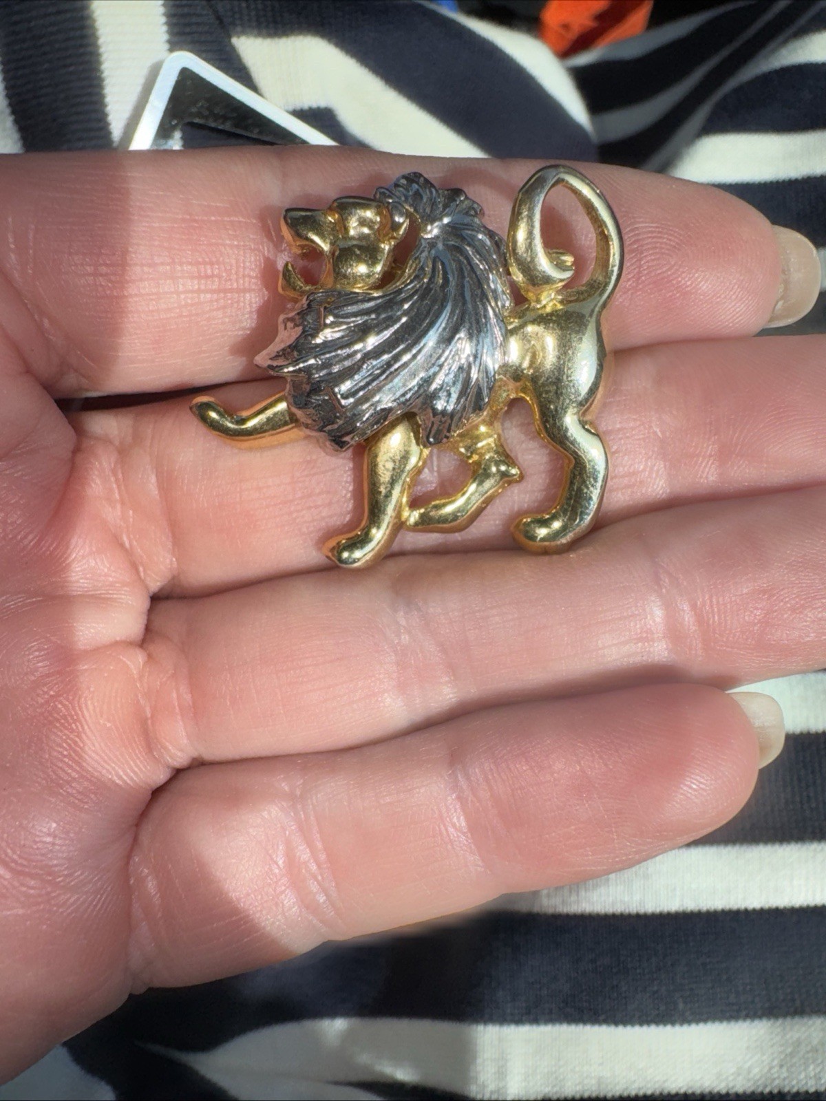 Vintage Lion Brooch High Polished gold and silver color about 1 in.