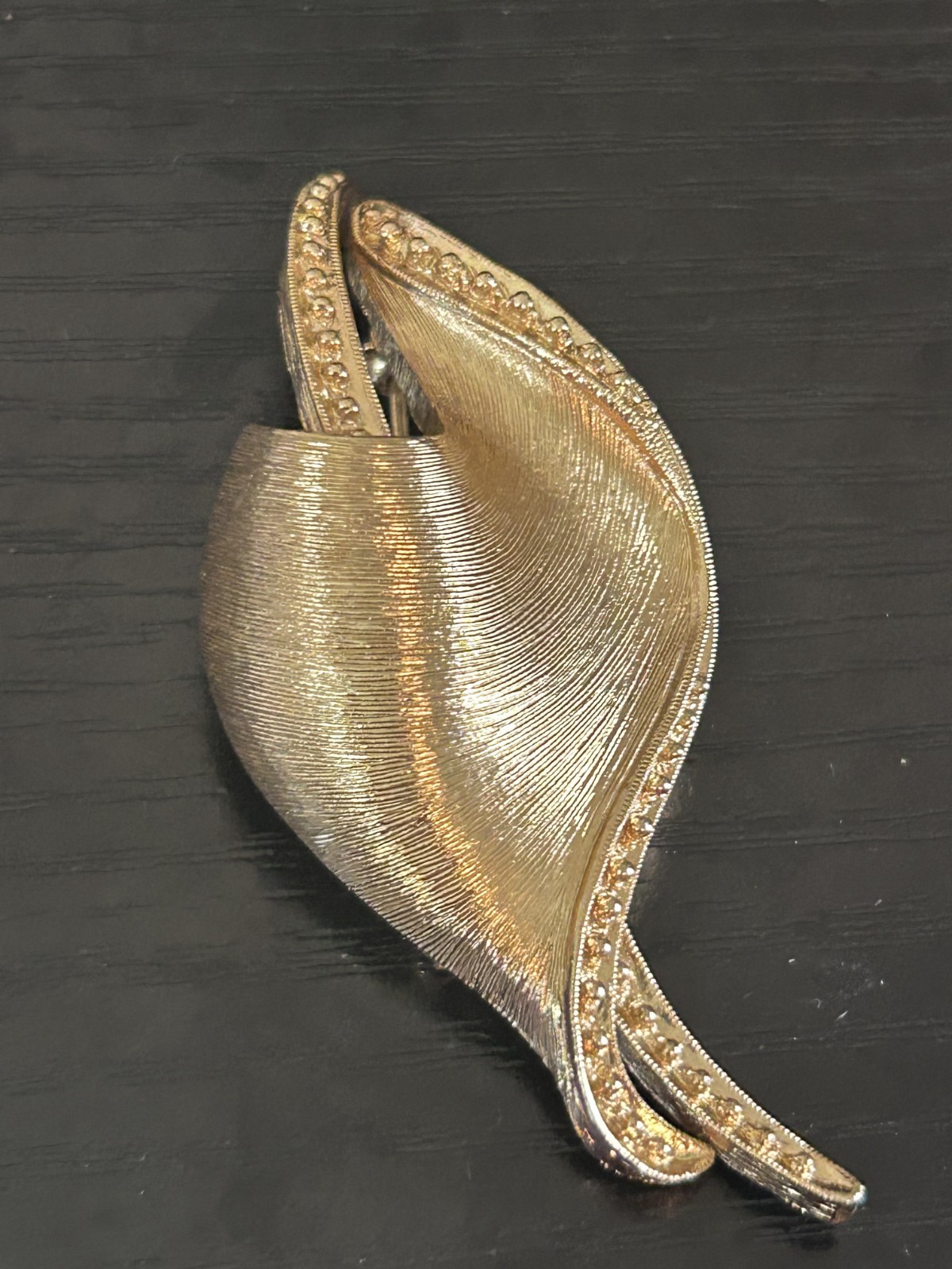 Vintage Wave-Shaped Ribbon Monet Brooch Brushed Gold Tone