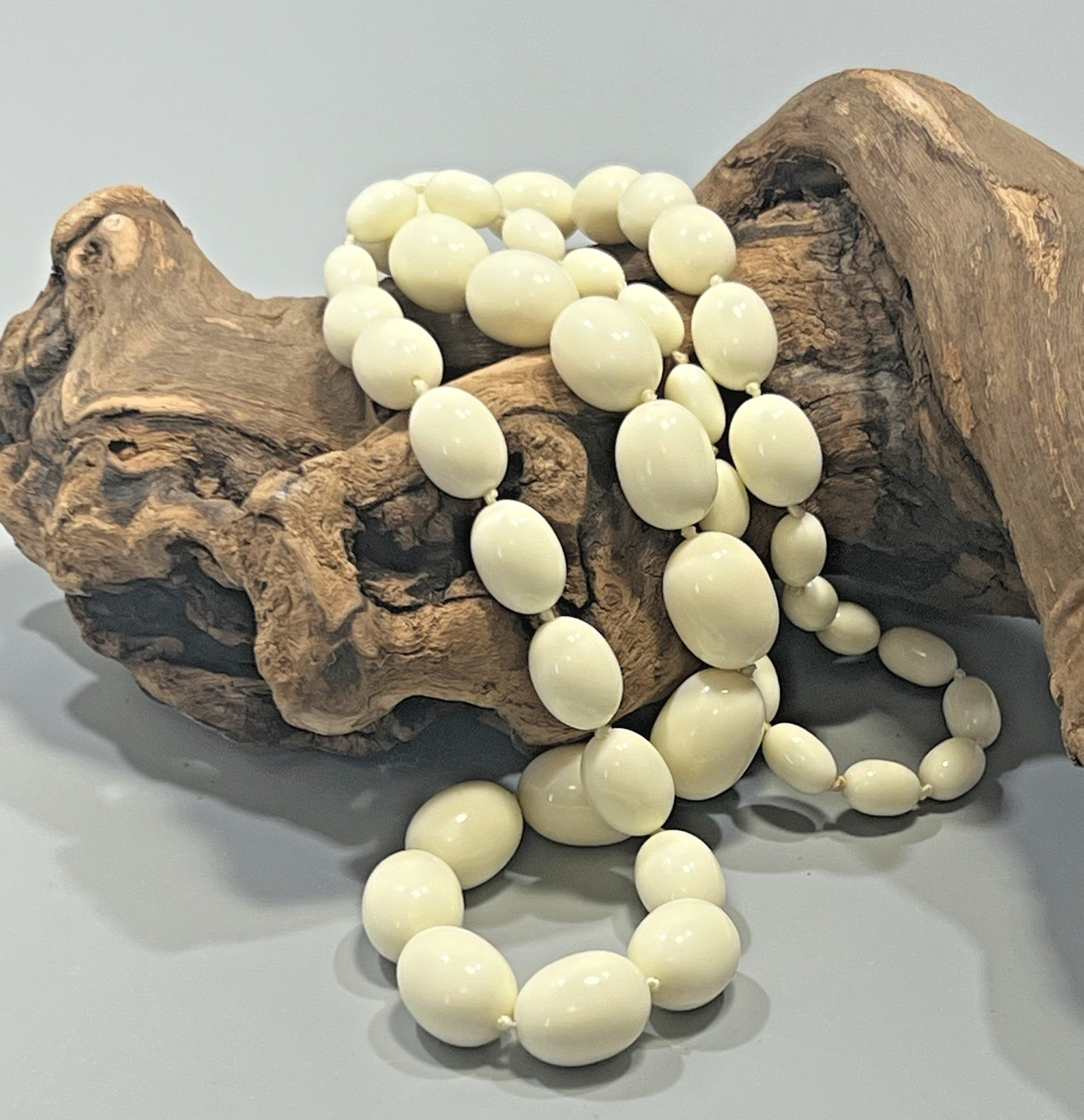 VTG 1960s Trifari Graduated Off White Ivory Oval Beads Knotted Necklace 30″ Long