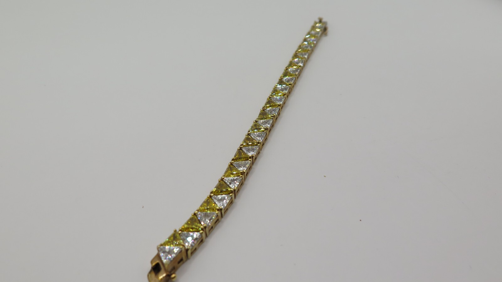 UTC Trillion Cut Tennis Bracelet, Gold Tone