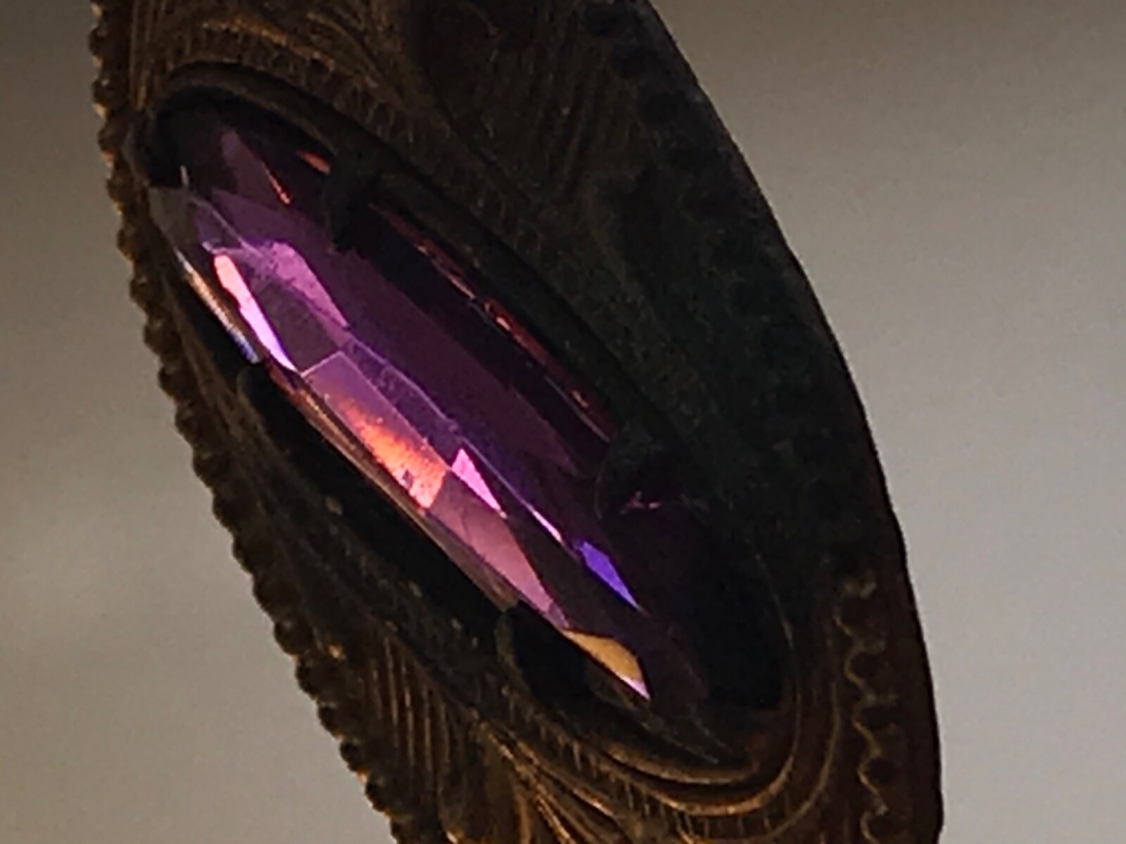Vtg. lapel pin possible amethyst stone