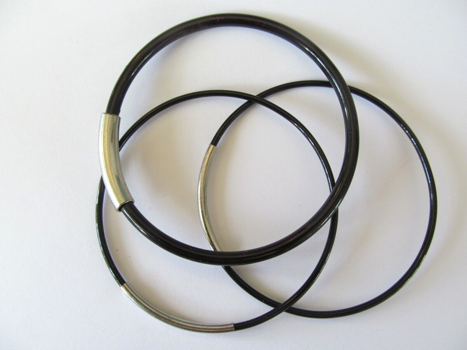 THREE DIFFERENT SHAPES BLACK METAL w/SILVER BAND DESIGNS SLIP ON BANGLE BRACELET