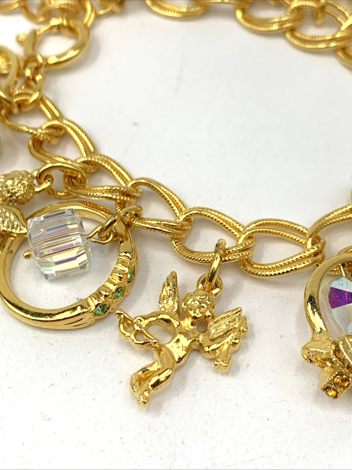 Kirks Folly Gold Tone Charm Bracelet Cupid Hearts Rings Crystals Angel