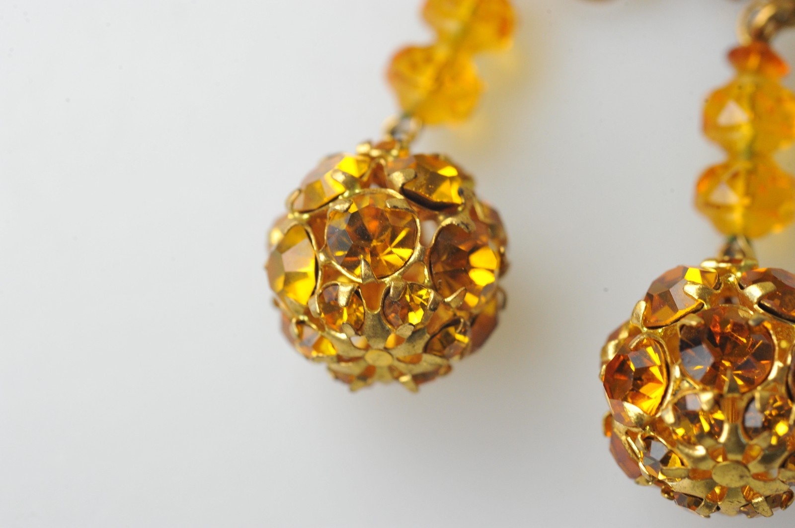 Vtg signed Miriam Haskell rhinestone Gold Tone drop clip earrings amber color
