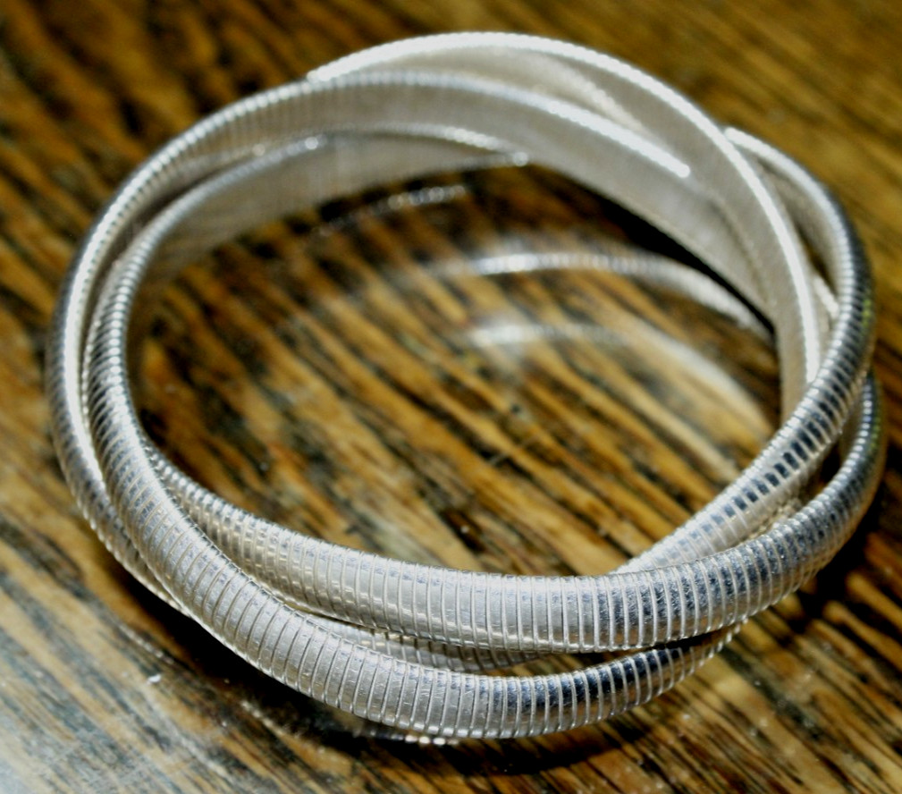 LEONORE DOSKOW STERLING SILVER TRIPPLE STRETCH BRACELET