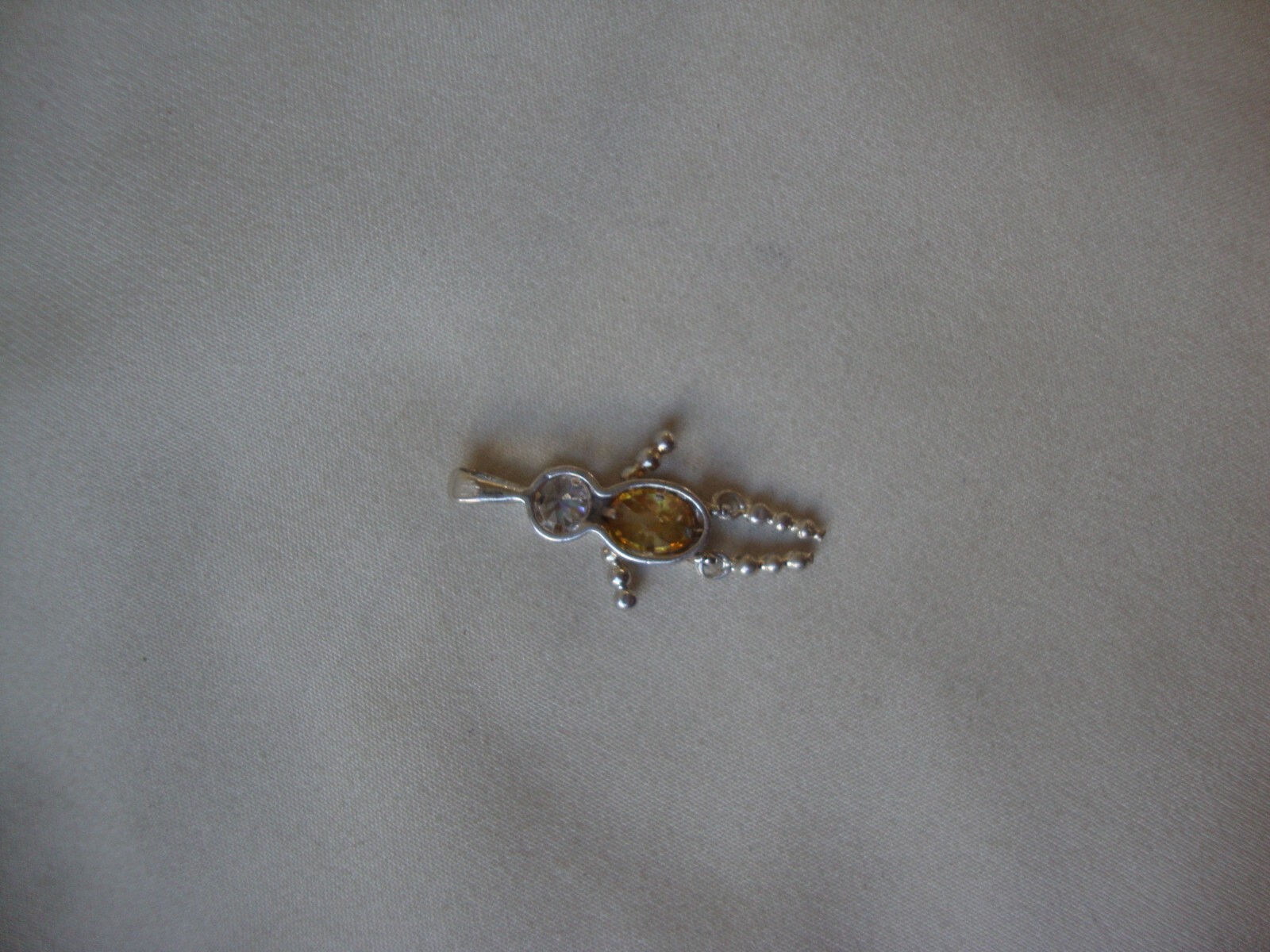 VINTAGE 1980s JIGGLY LEGS BOY OVAL YELLOW CZ BIRTHSTONE SILVER 925 CHARM/PENDANT