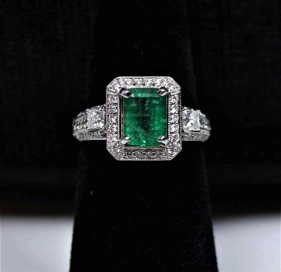 Features A Stunning Emerald Cut Emerald With Old European Cut CZ Classic Ring FN