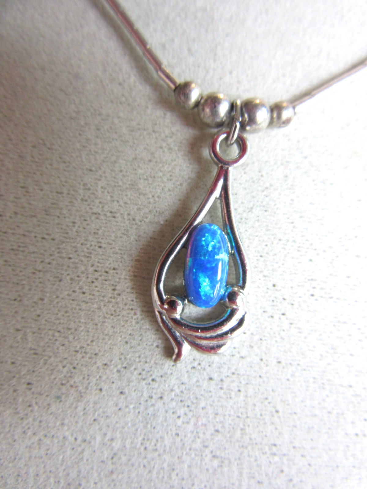 Vintage liquid silver beaded necklace with a blue opal pendant – 16.5″ long