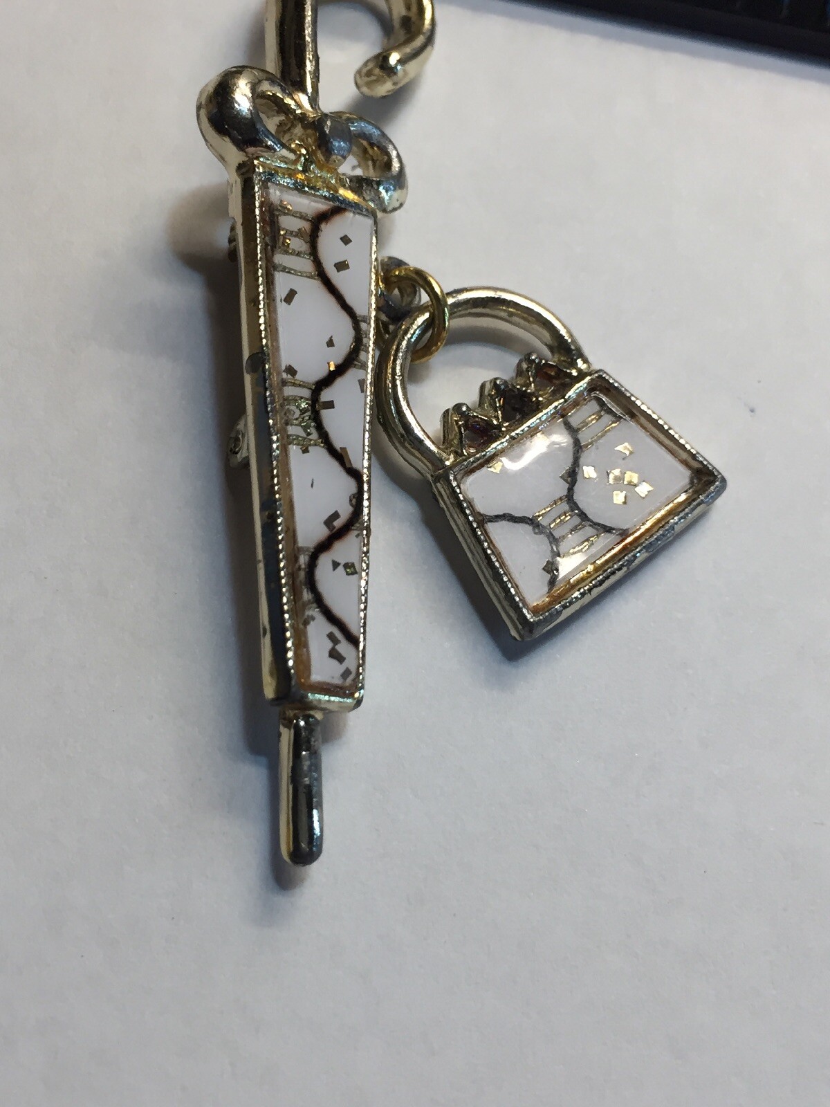 Vintage 2 3/8″ White Gold Enameled Umbrella w/Dangling Purse Brooch Pin