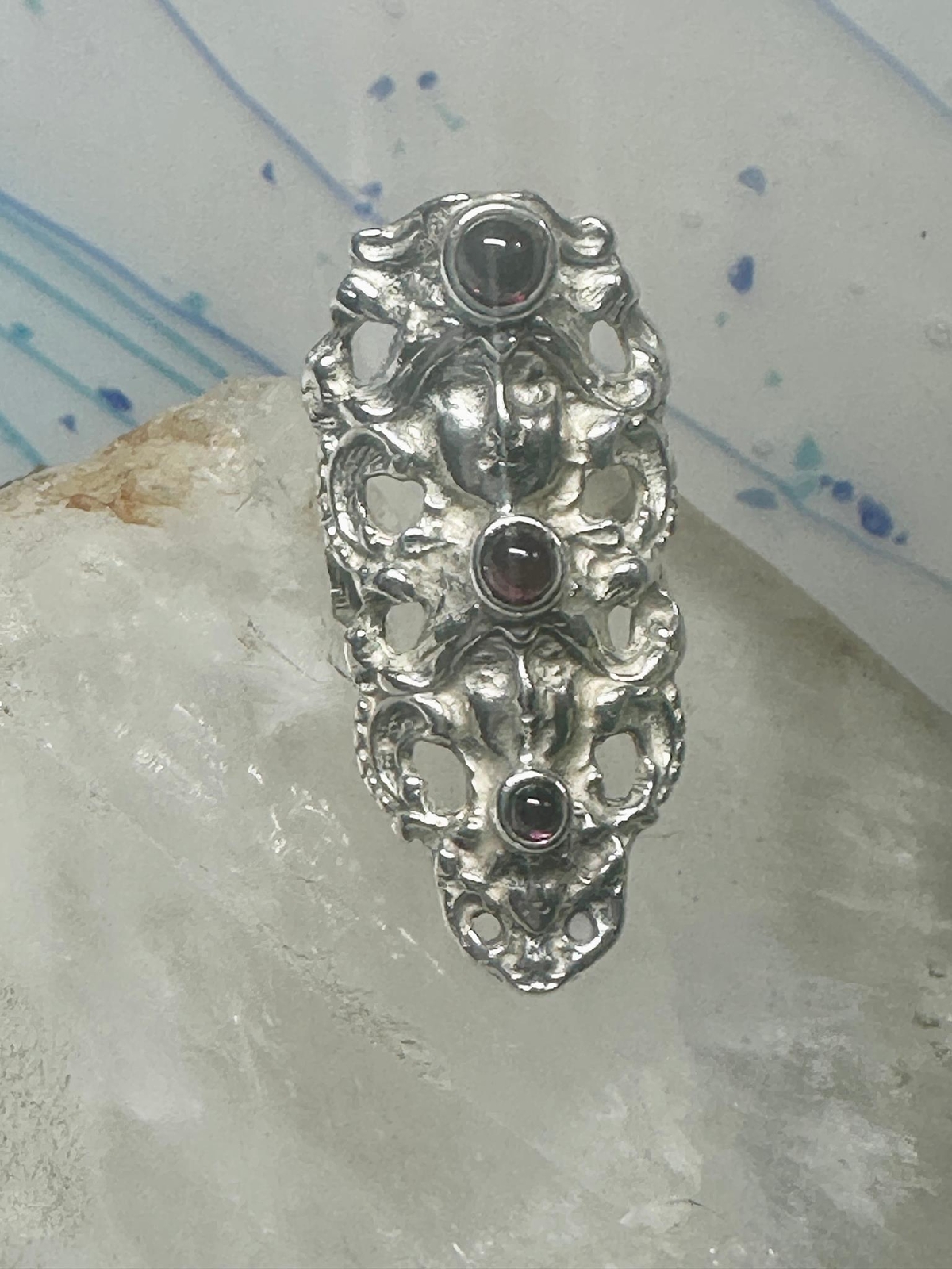 Face ring long figurative Art Deco influences garnets size 5.75 sterling silver