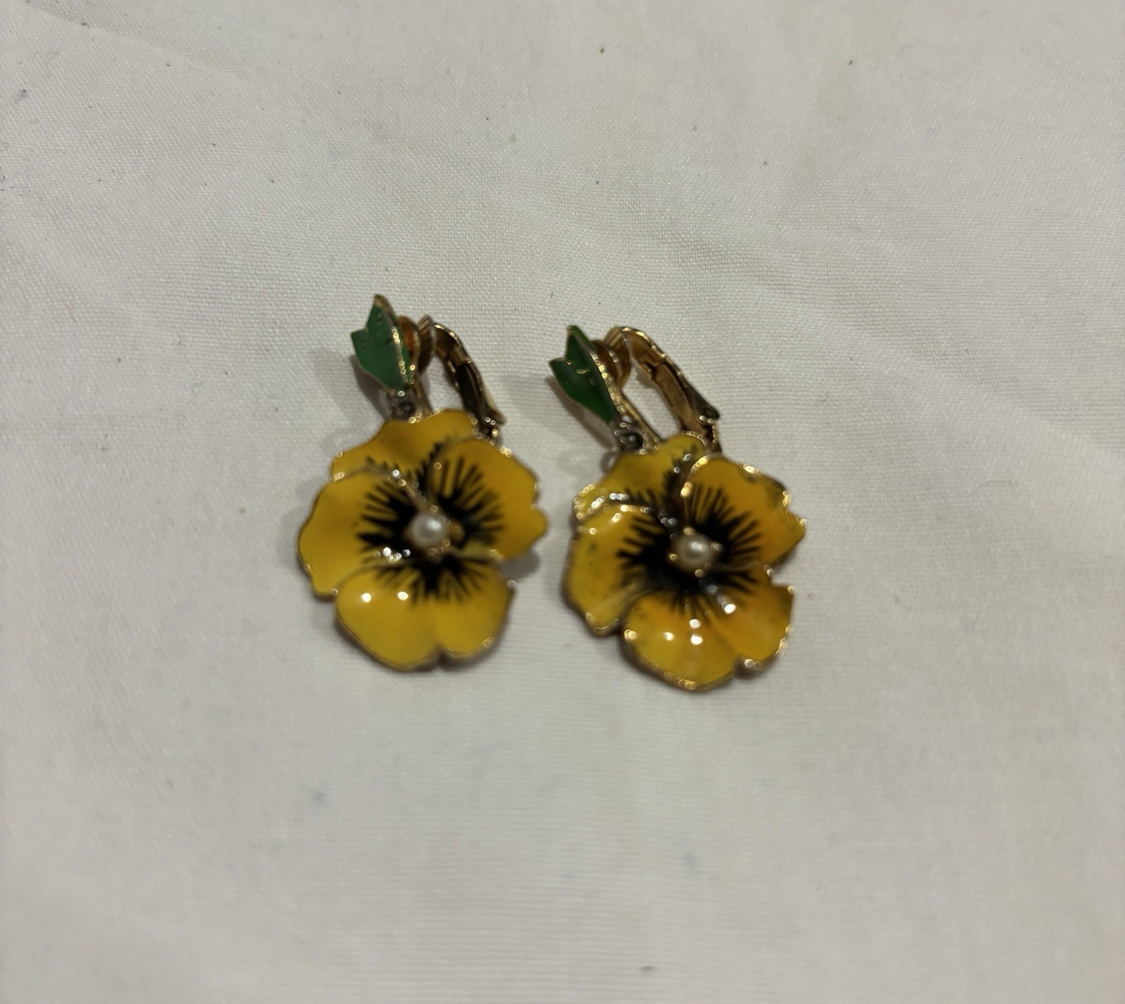 Vintage yellow enamel pansy flower clip earrings