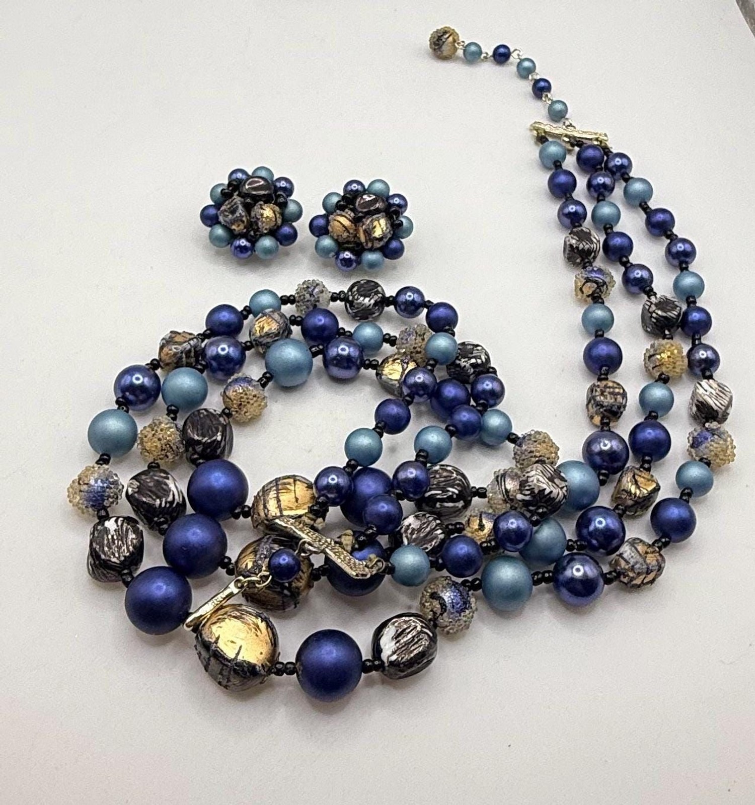 Vintage blue and gold two strand necklace and clip on earring set