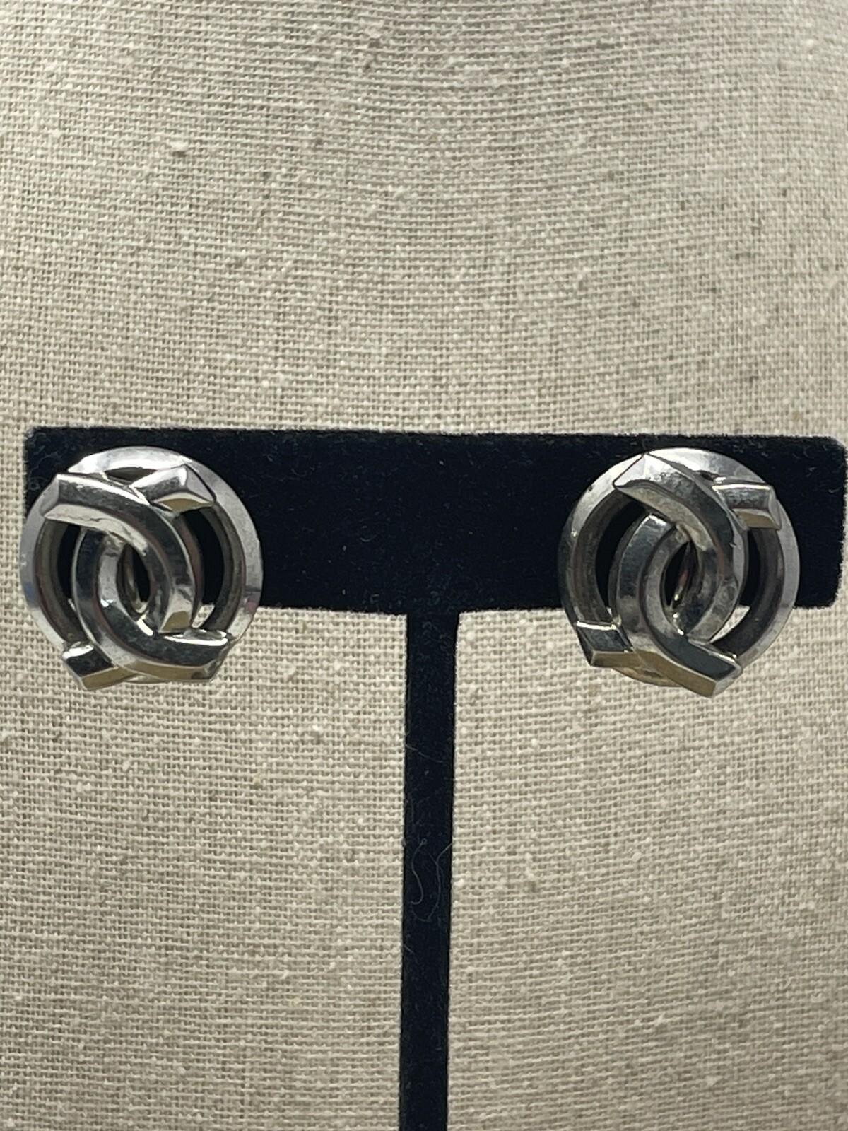 Vintage Mid Century Silver Tone Interlocked Circle Screw Back Earrings MCM Knot