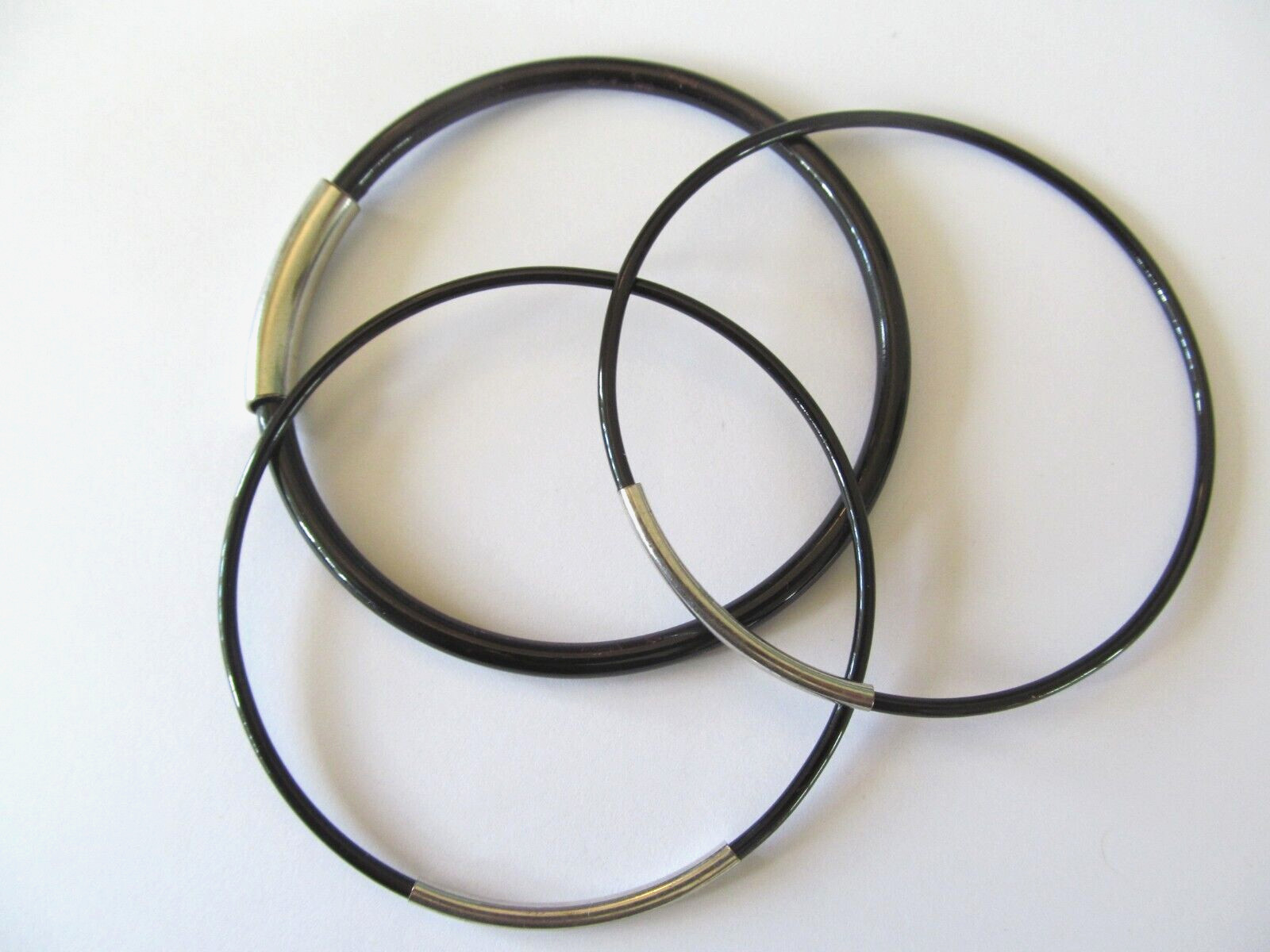 THREE DIFFERENT SHAPES BLACK METAL w/SILVER BAND DESIGNS SLIP ON BANGLE BRACELET