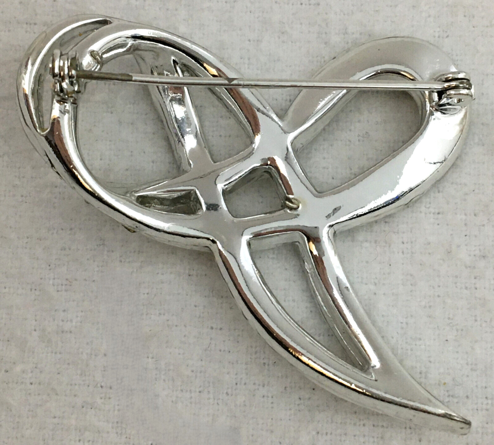 SilverTone Swirl Ribbon Brooch Pin With Clear Round with Bagette Crystals TG
