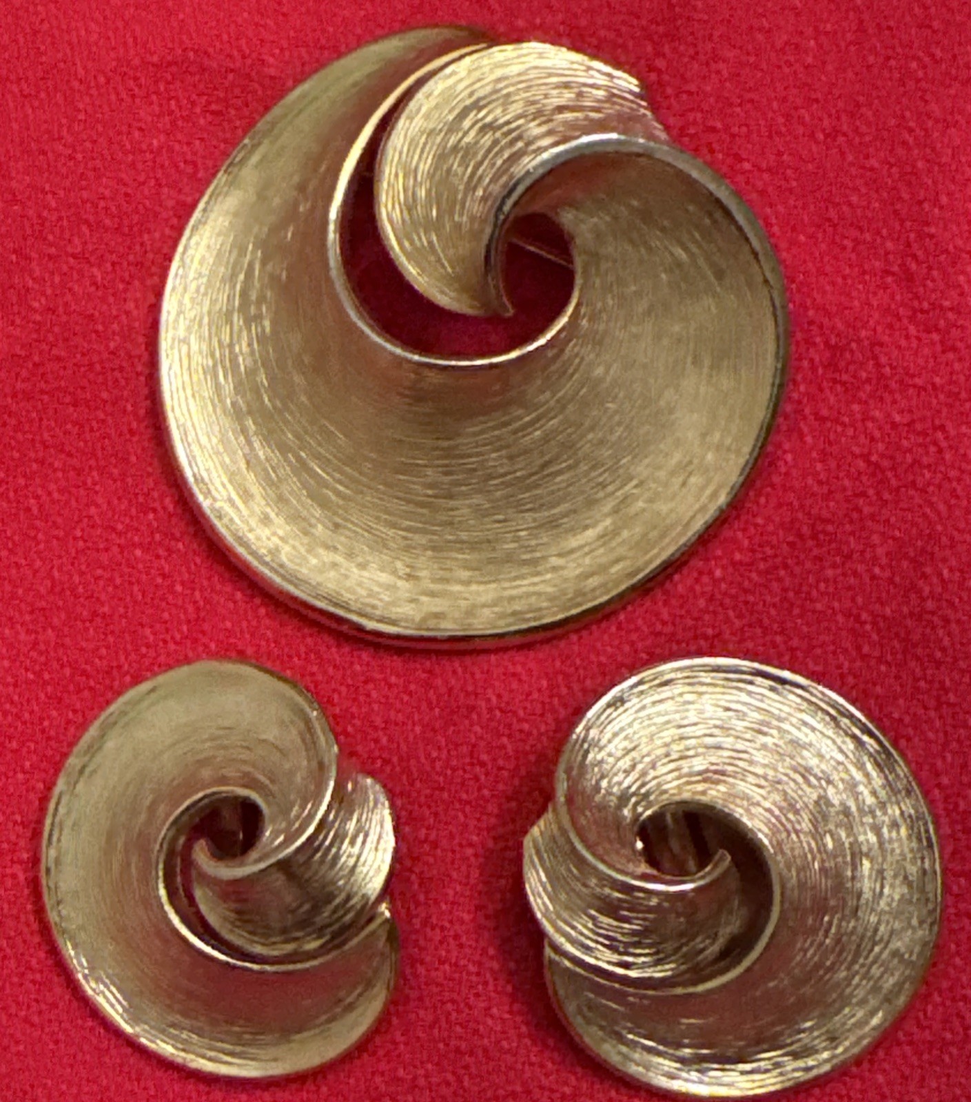 Vintage Crown Trifari 1 3/4” golden swirl brooch with 1” clip on earrings