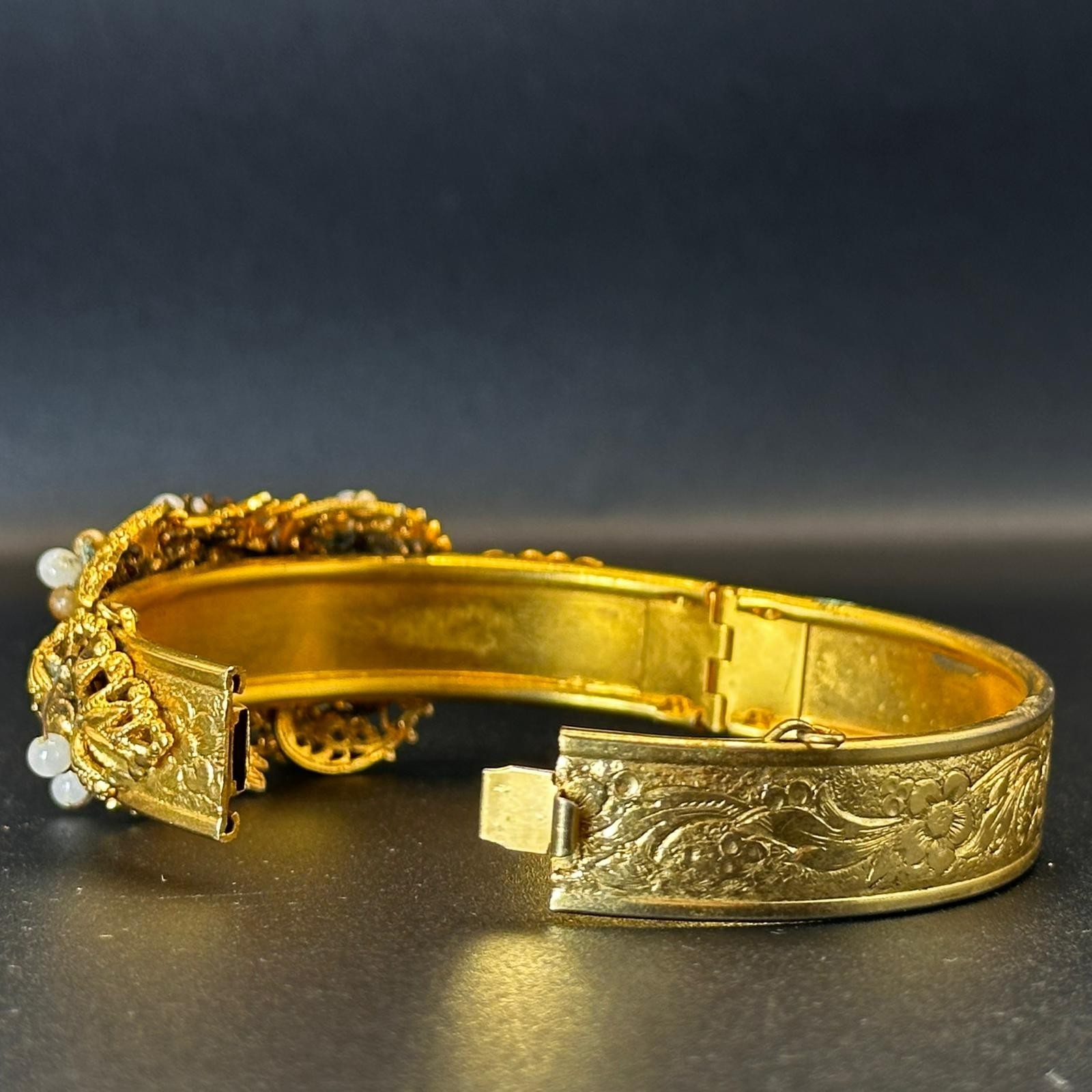 A Vintage Gold Toned Custom Jewelry Bangle Bracelet