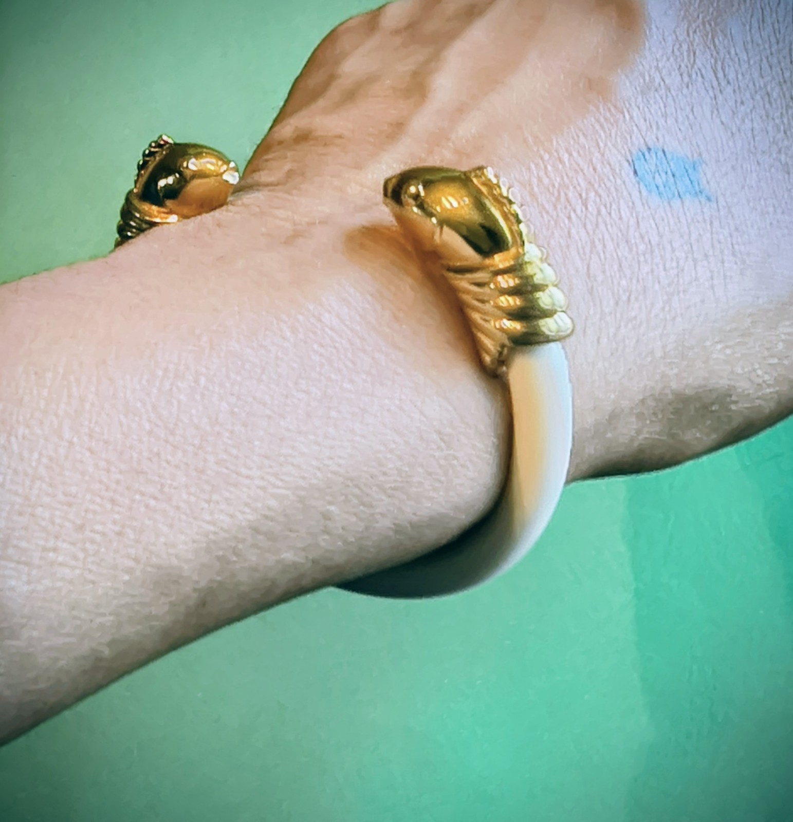Signed Monet vintage bracelet with a bright gold-tone finish.