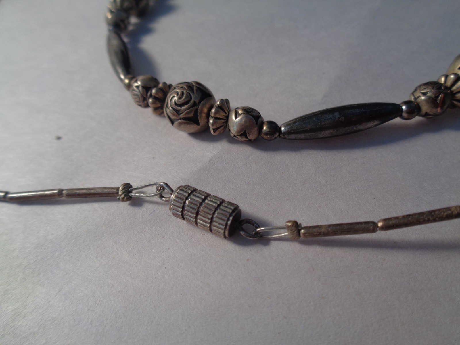 VINTAGE SOUTHWESTERN STYLE SILVER LIKE 28 INCH NECKLACE,BALLS,BARRELS,DISCS.