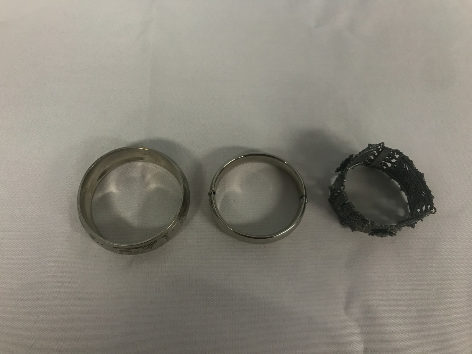 3 VINTAGE SILVERTONE HINGED BANGLE, PIERCED FILLIGREE & ETCHED FLOWER BRACELETS