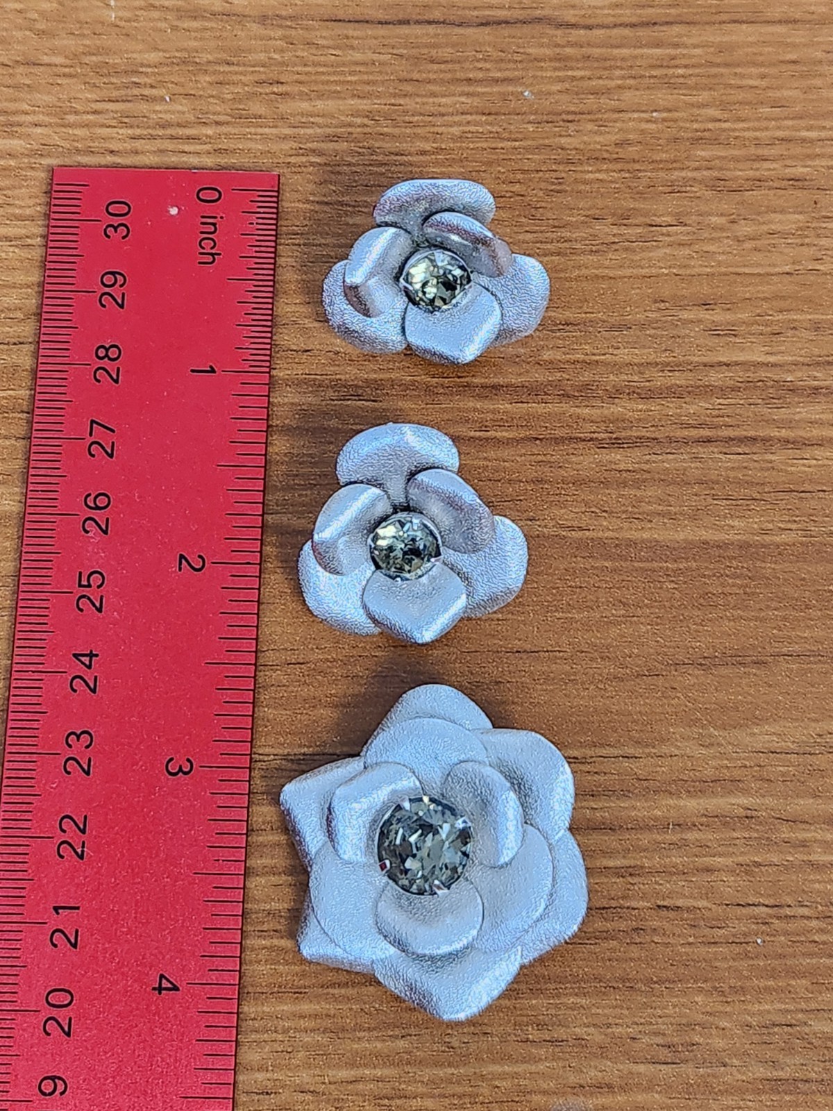 Stunning Silvertone and Rhinestone Flower Clip Earrings And Brooch