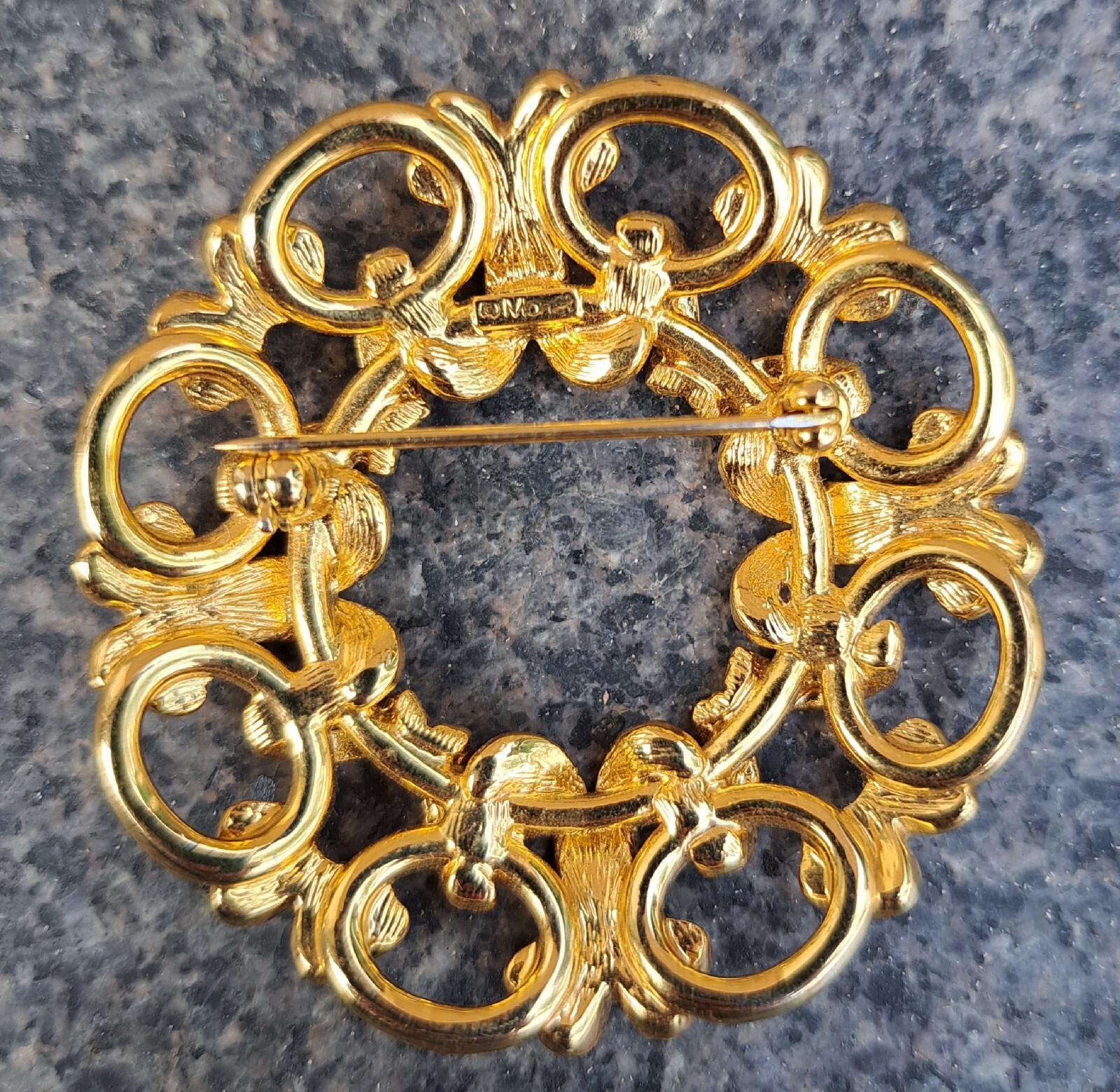 Vintage Monet Gold Tone Rhinestone Round Circular Brooch Signed Bows Ribbons @