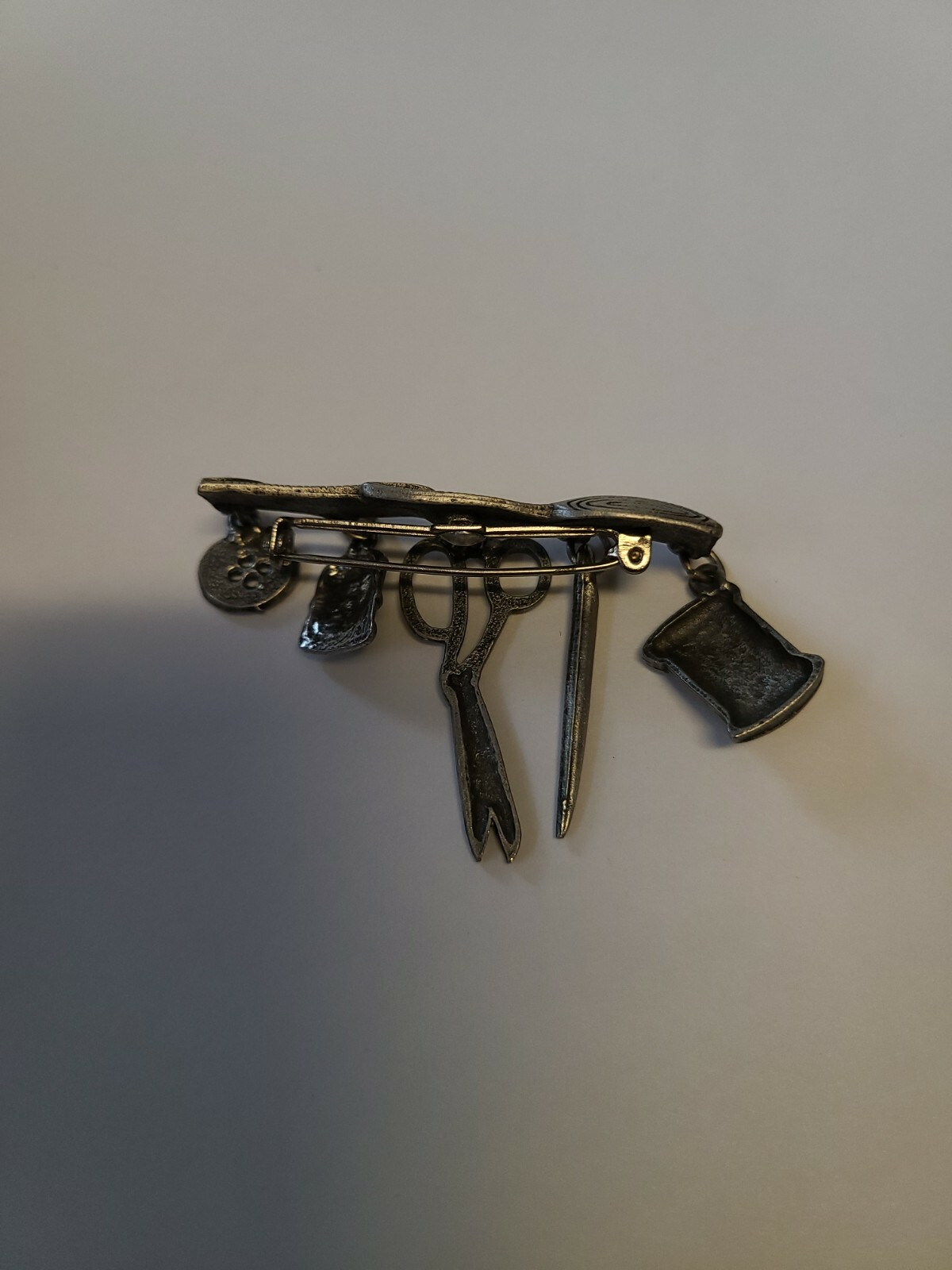 Vintage Retro Silver Tone Tape Measure Sewing Notions Brooch Pin- Signed JJ